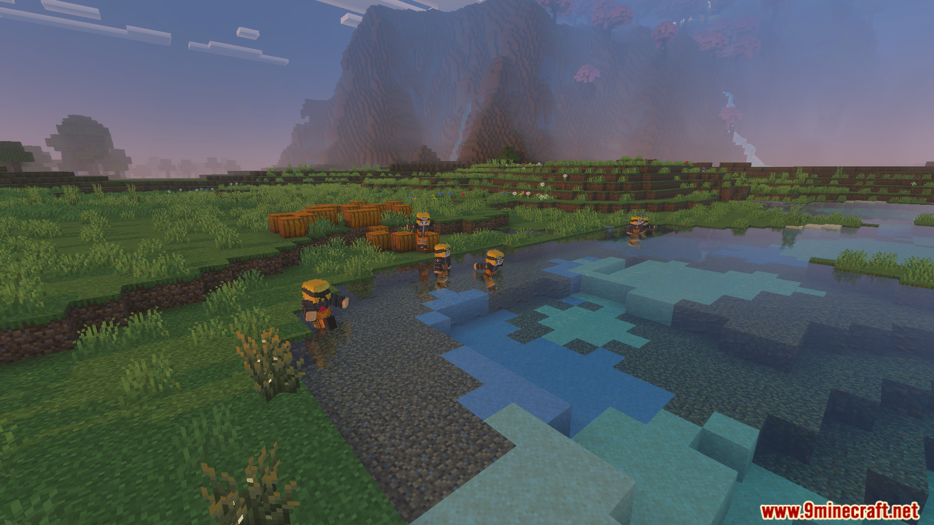Naruto Uzumaki character models standing near a lake and a pumpkin patch
