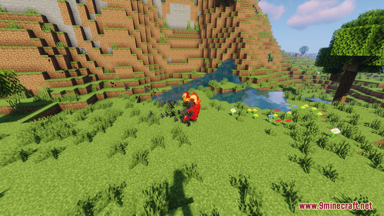 Neko's Dragon Blazes Resource Pack Screenshot 8 A small red dragon creature hovering above a green field in Minecraft