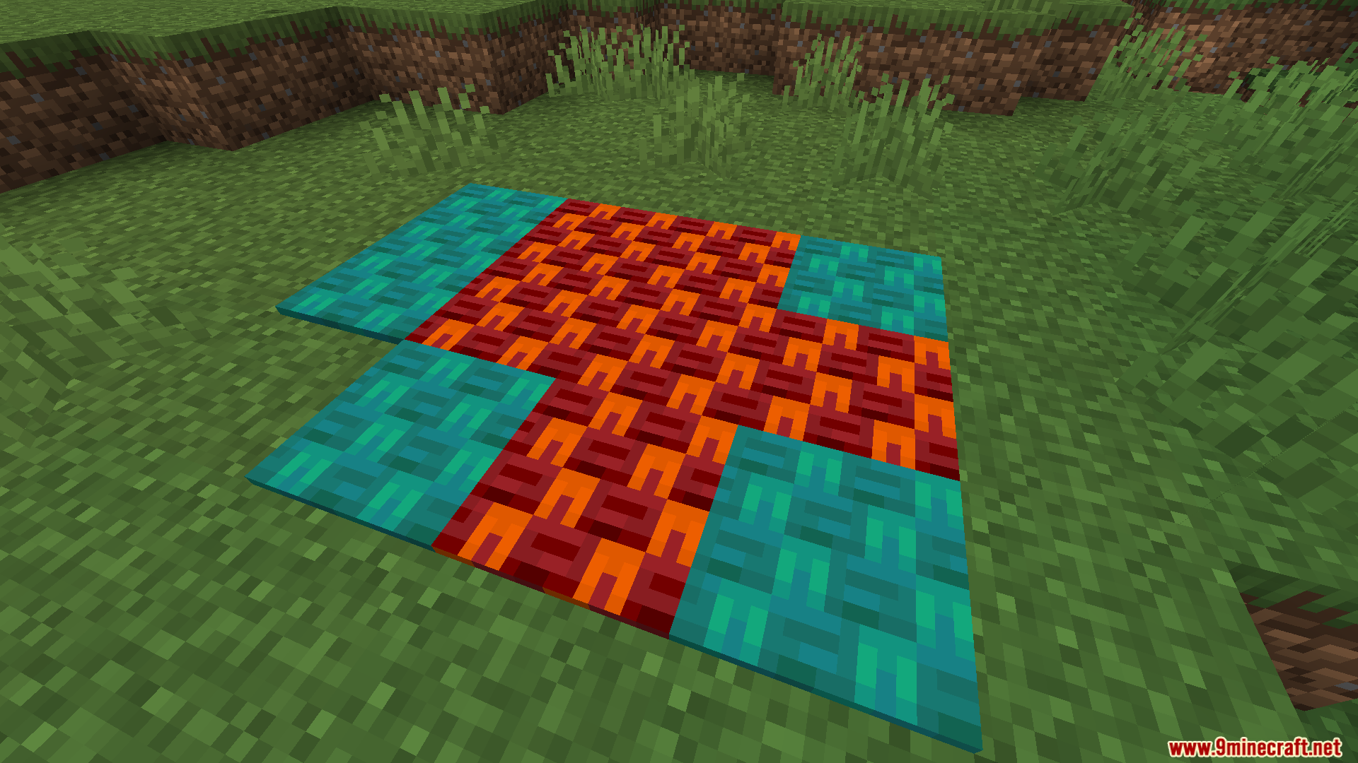 Nether Depths Upgrade PT BR Translation Resource Pack Screenshot 9 Red and blue patterned blocks placed on a grassy field in Minecraft