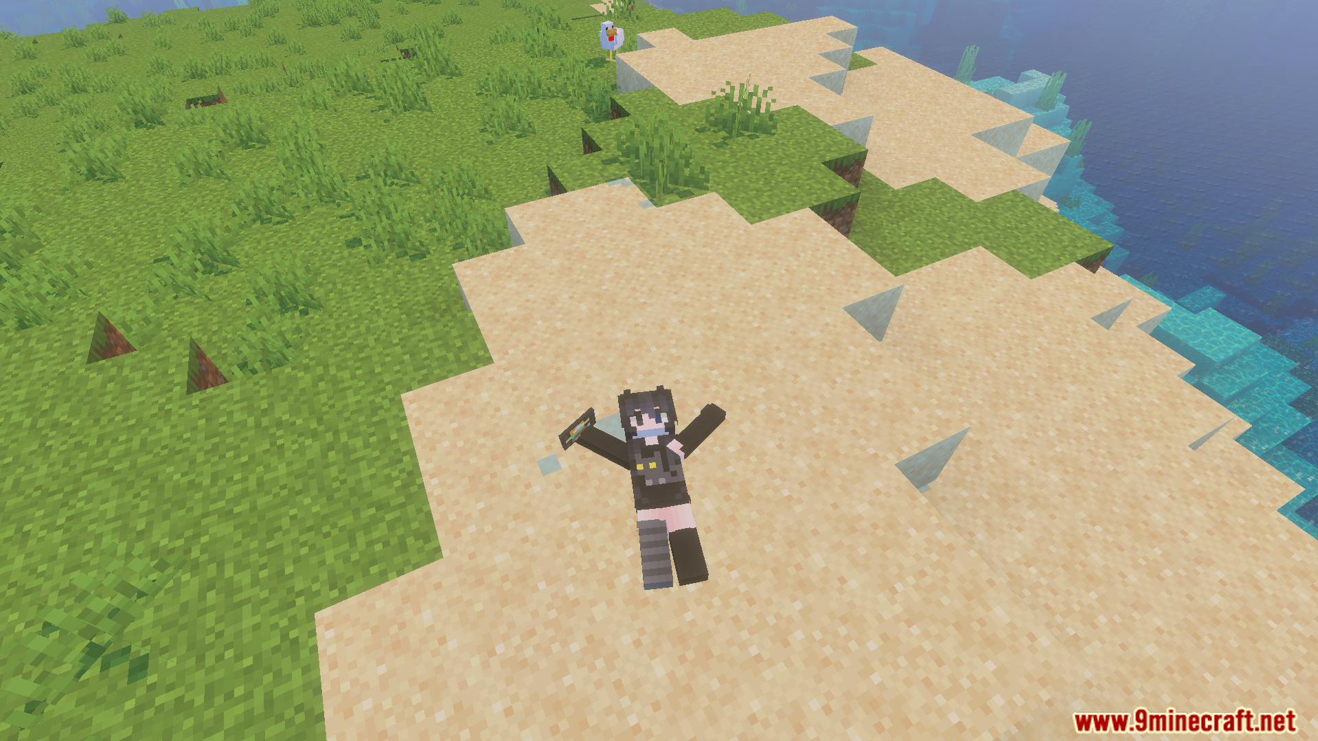 Not Enough Emotes Addon Screenshot 6 A Minecraft character performing a snow angel animation on a sandy beach