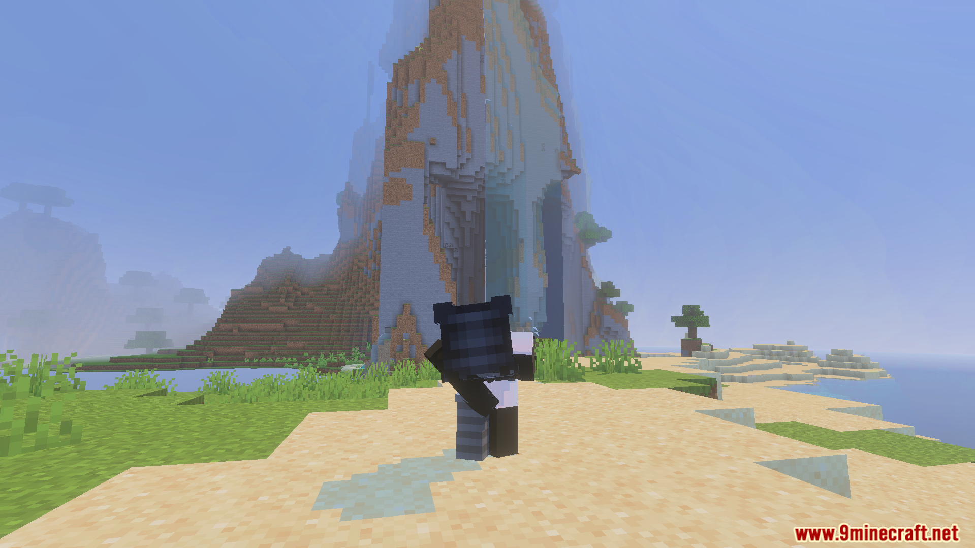 Not Enough Emotes Addon Screenshot 8 A character performing a custom animation while looking at a large mountain