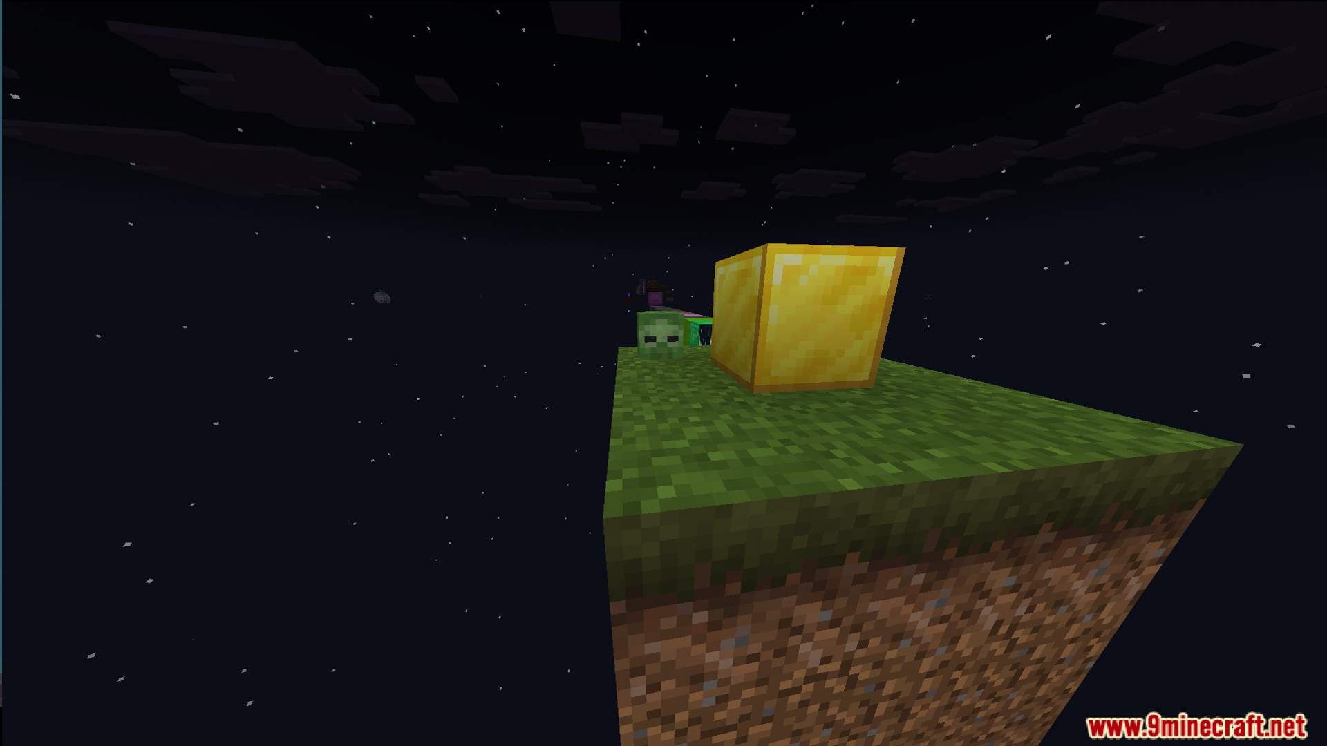 Floating items orbiting a special gold block on a grass platform at night