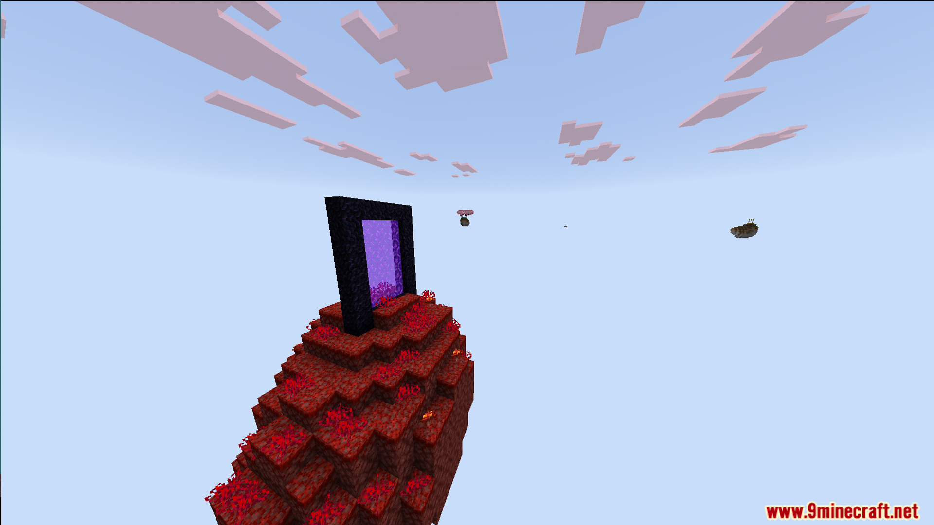 A nether portal stands on a floating island made of crimson blocks