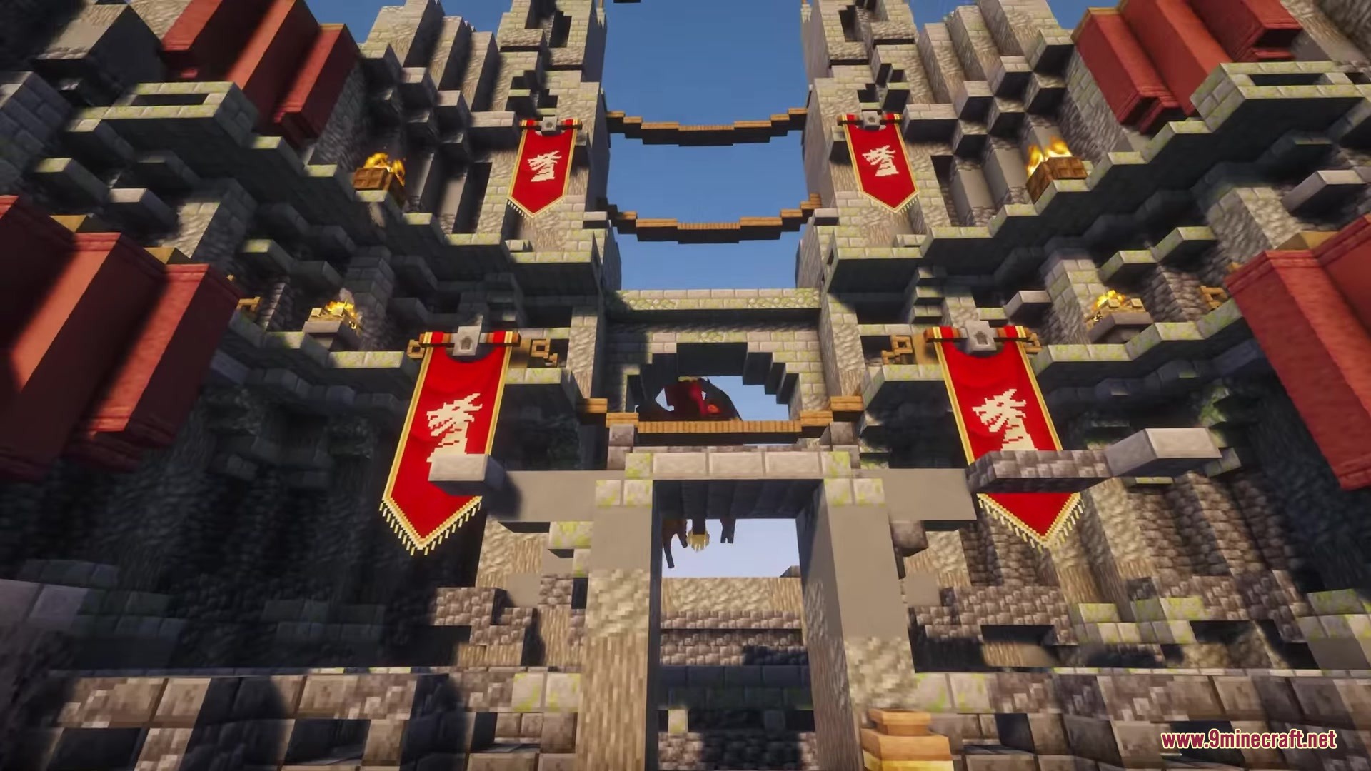 Orbital Railgun Reforged Mod Screenshot 8 A medieval castle courtyard with red banners and wooden bridges between stone walls