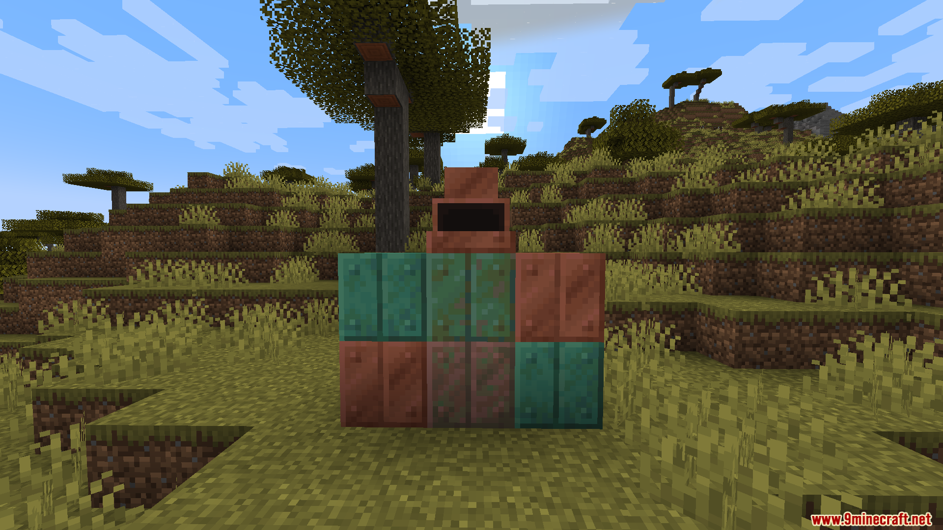 Various copper blocks in different oxidation stages with a copper furnace on top