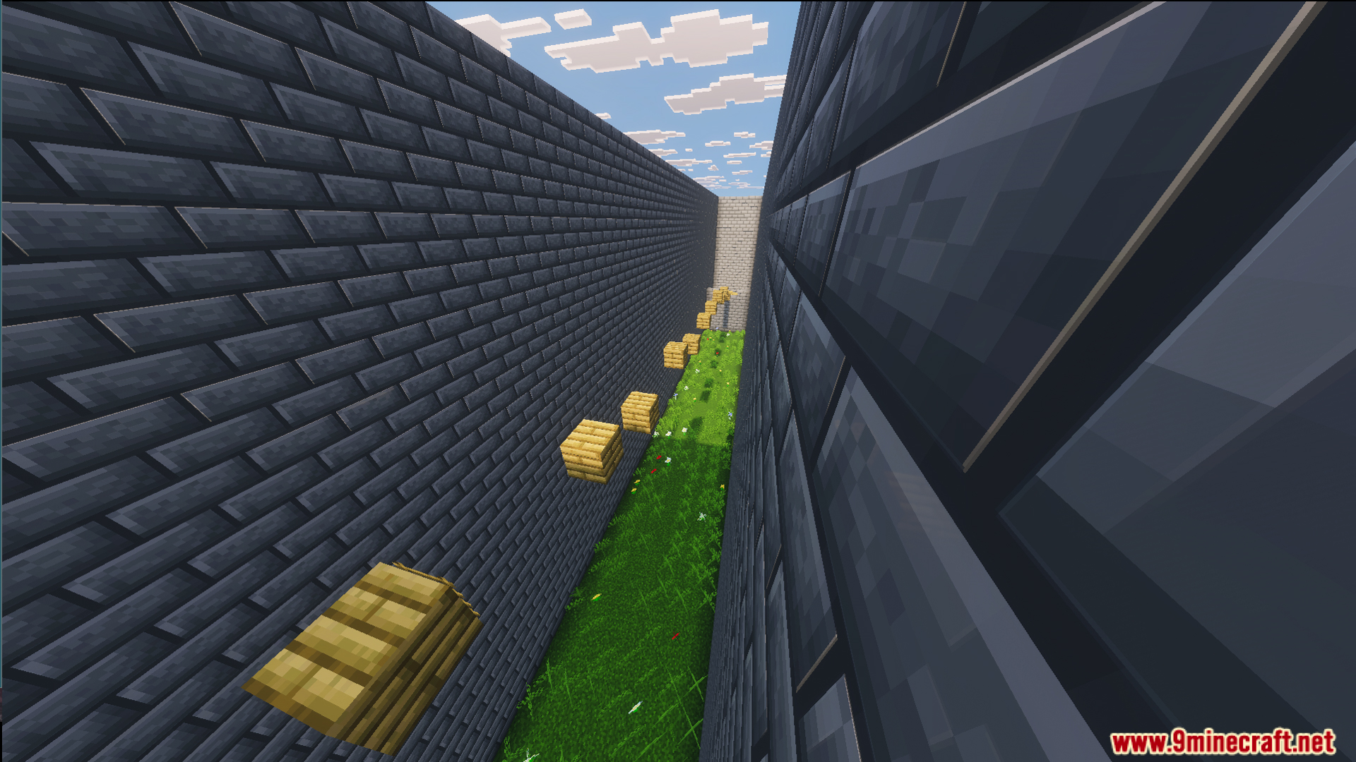 Easy jumps inside a narrow stone brick corridor with floating wooden blocks