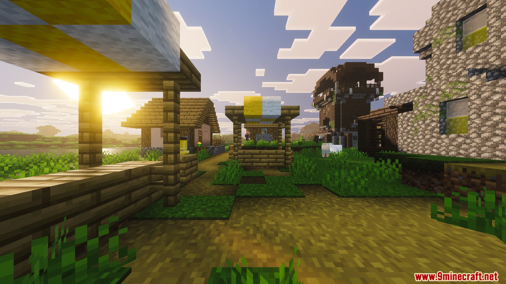 Part II OP Tool Smith Mod Map Screenshot 10 Scenic view of a custom village with a pillager outpost nearby at sunset