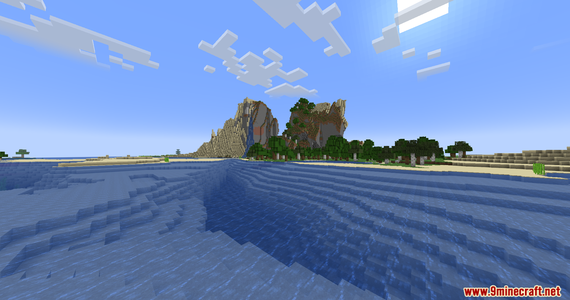 Realistic water waves and a tall mountain under a bright blue sky