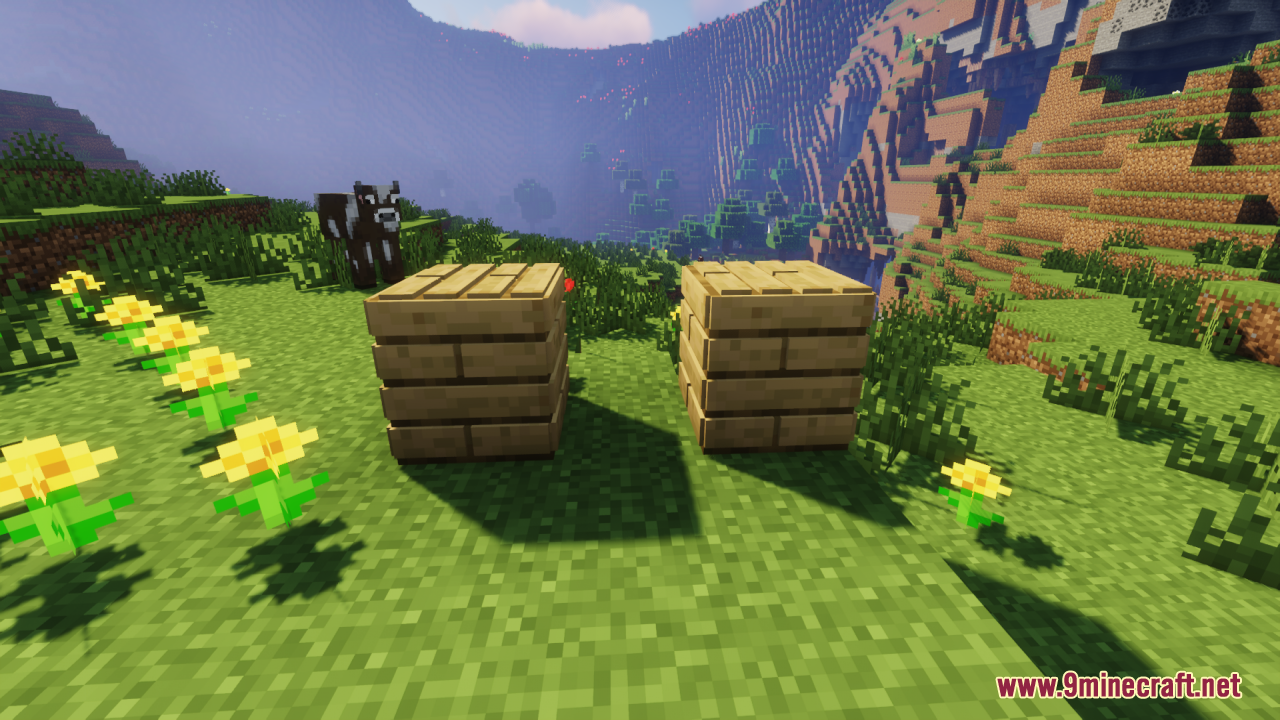 Two wooden blocks with realistic depth effect placed on grass in a landscape