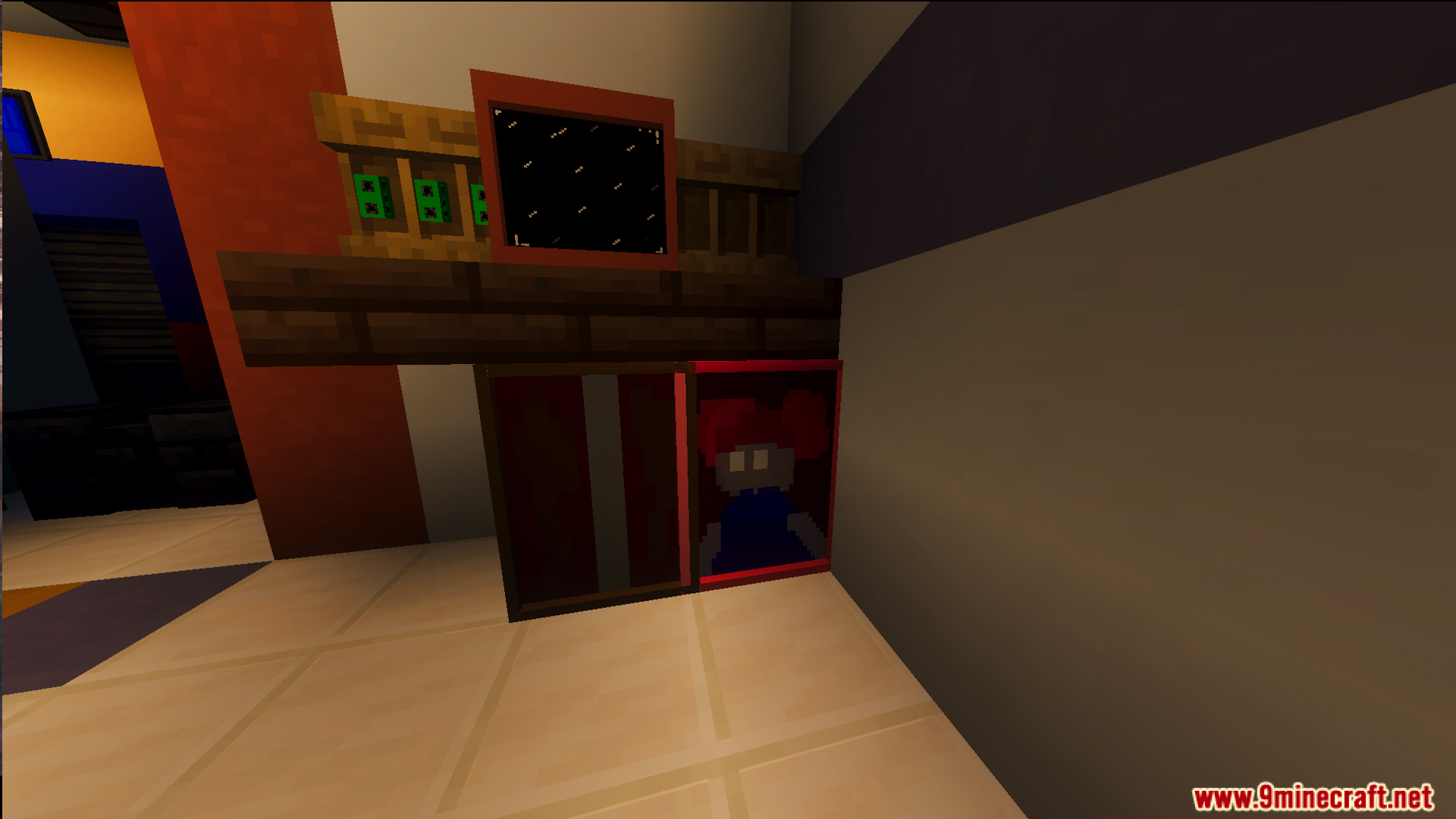 A small doll inside a red display case under a wooden shelf