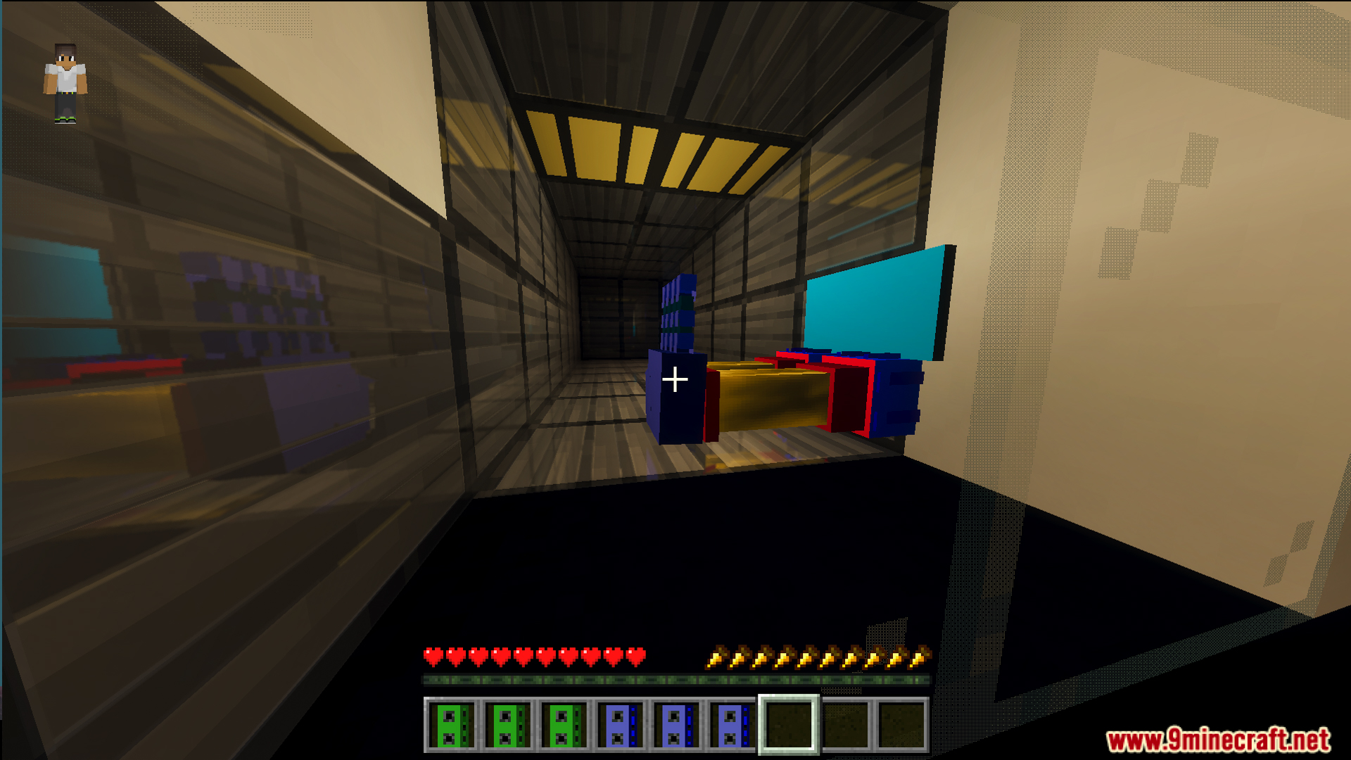Player walking through a narrow glass hallway with a blue and red tool