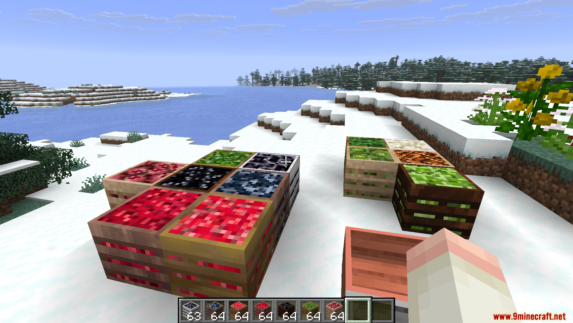 Productive Farming Mod Screenshot 11 Various colorful crops displayed in wooden crates within a snowy Minecraft landscape