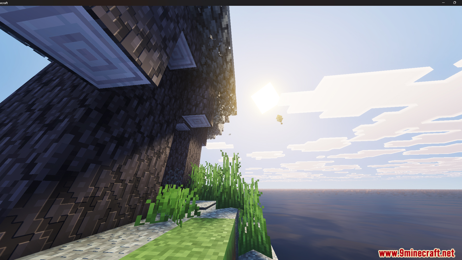A rocky cliff on a custom island overlooking the vast and open ocean