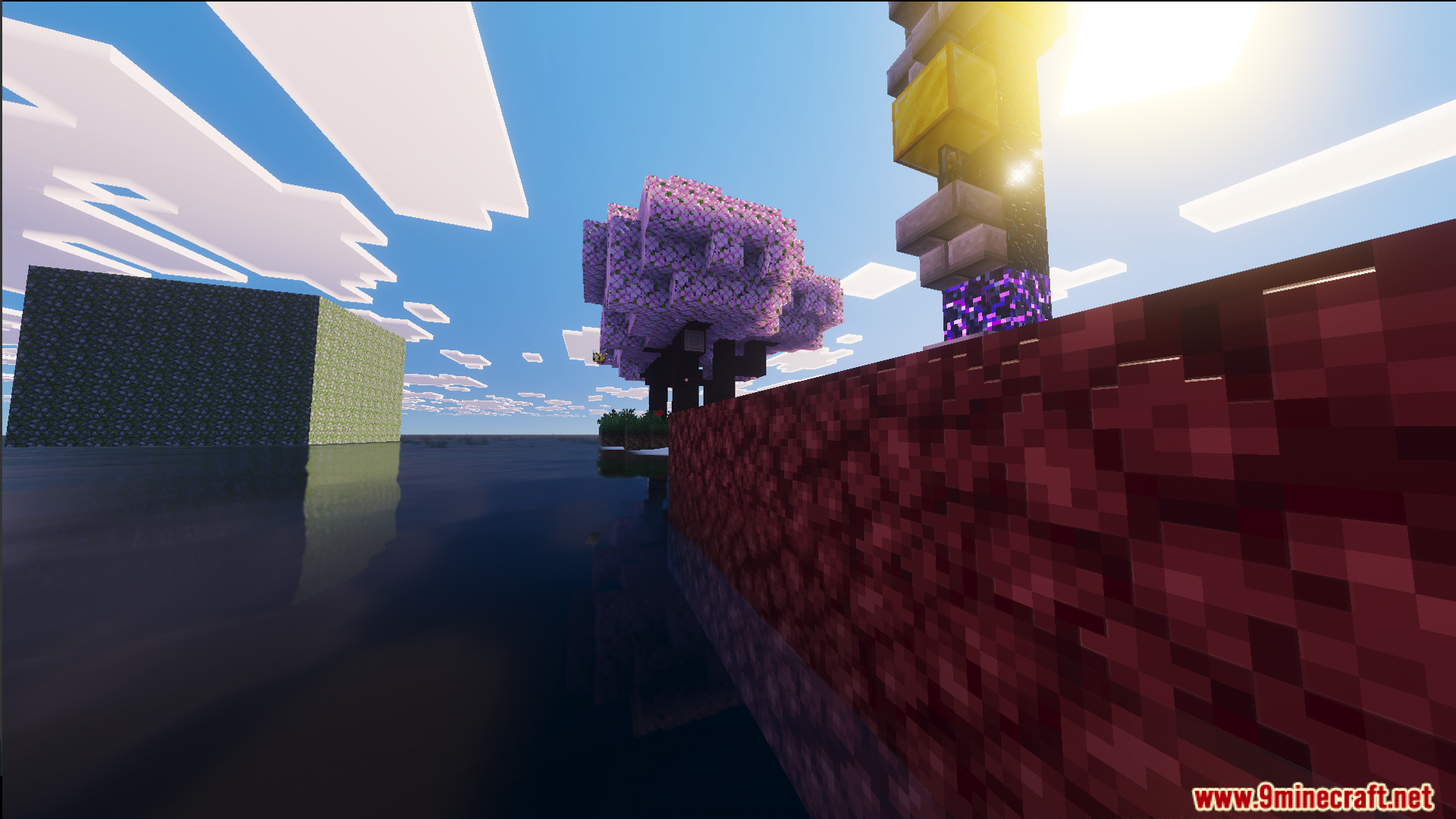 Ruined nether portal with gold blocks near a floating island in the ocean