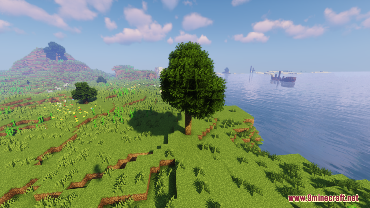 Rainbow's Foliage Resource Pack Screenshot 5 A bushy tree stands on a grassy cliff overlooking the vast blue ocean