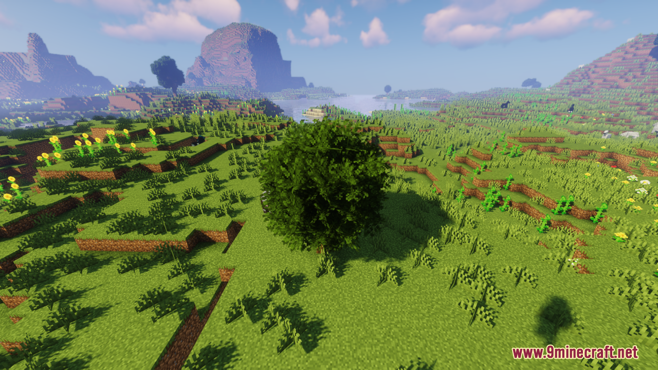 Rainbow's Foliage Resource Pack Screenshot 6 A bushy tree grows in a vibrant meadow filled with yellow sunflowers