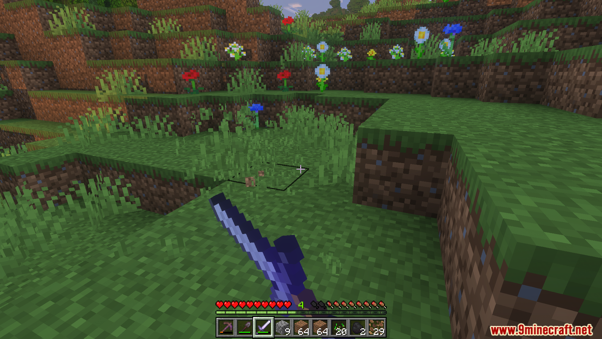 Random Enchantment Addon Screenshot 8 Player holding an enchanted sword while standing in a field of flowers
