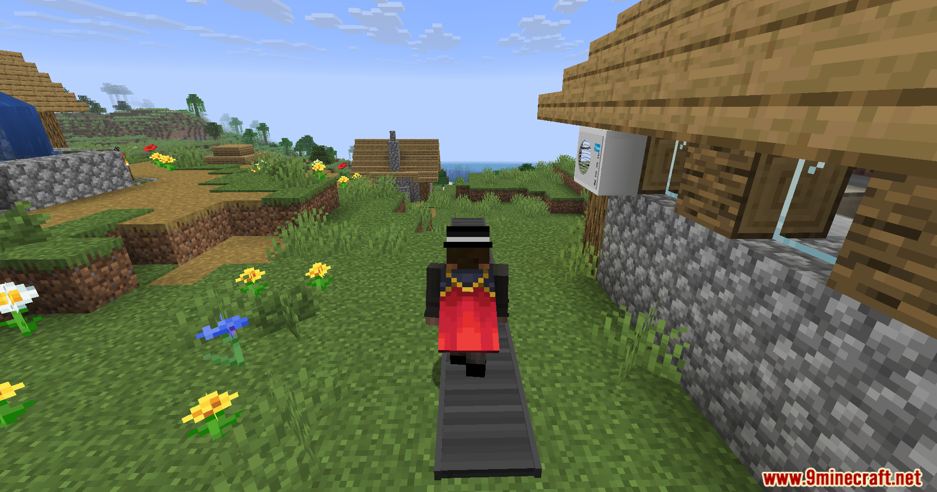 A player character with a red cape stands on a conveyor belt