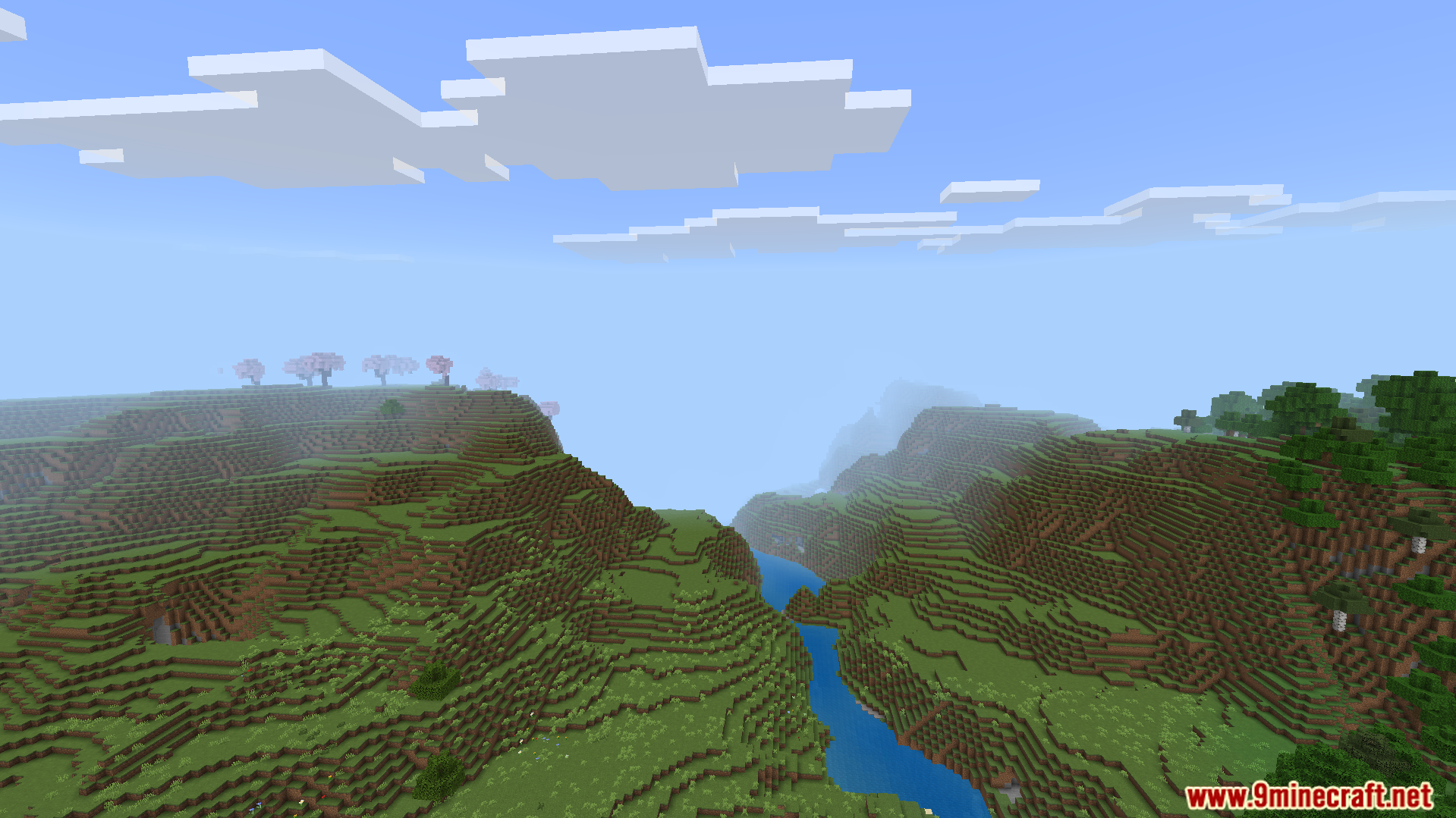 Rebuilt Shader Screenshot 7 A scenic Minecraft landscape featuring rolling green hills and a winding blue river
