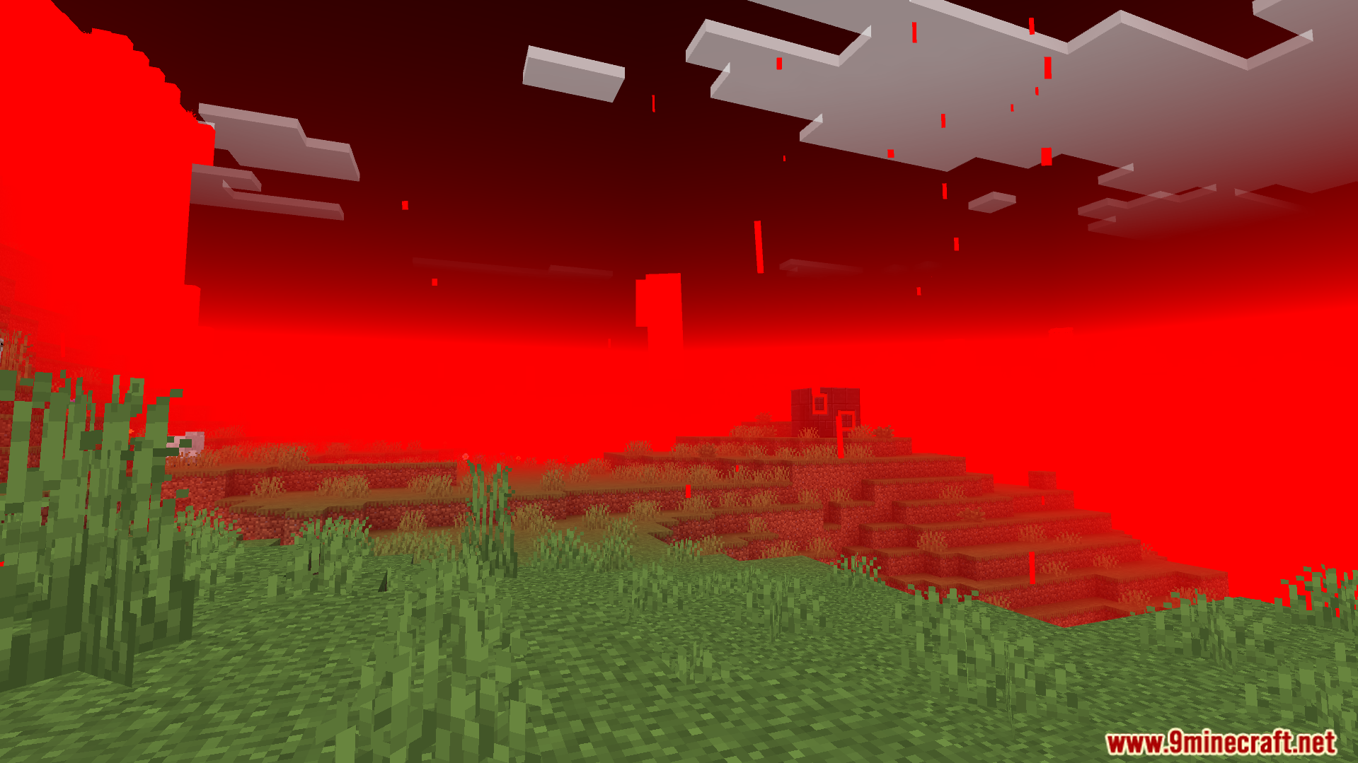 A landscape covered in thick red fog within a custom redstone biome