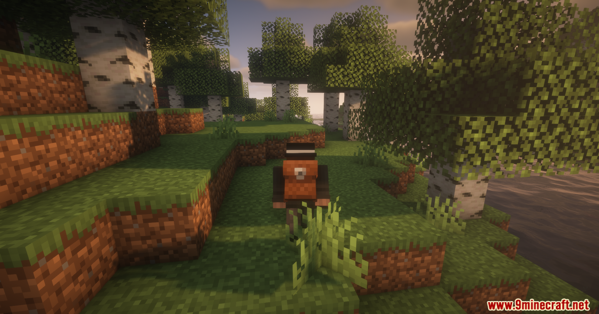 Reliable Backpacks Mod Screenshot 6 A player wearing a Reliable Backpack stands near a river in Minecraft