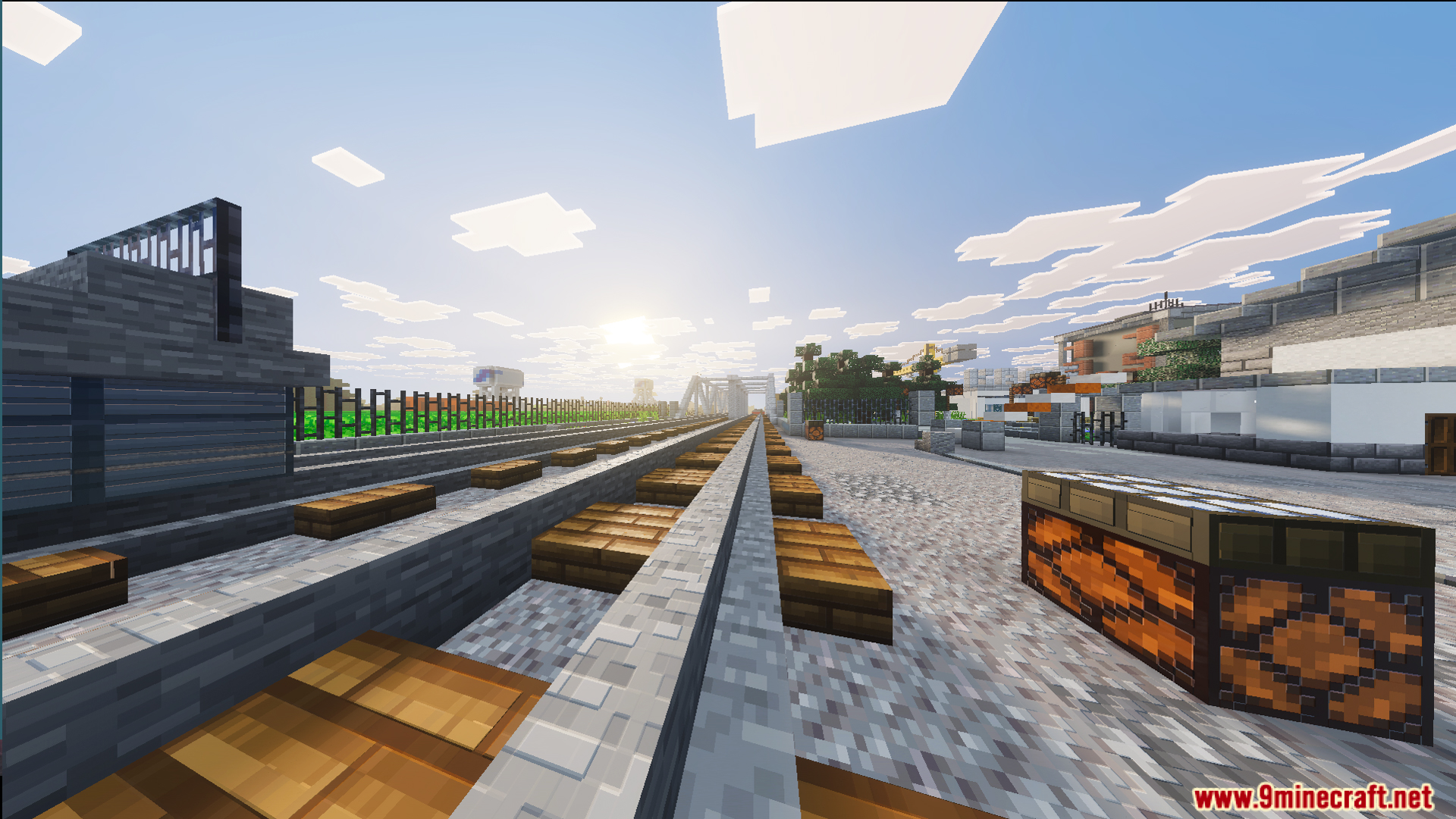 Russ Big City Reborn Map Screenshot 9 Railway tracks with wooden sleepers leading towards a city at sunset