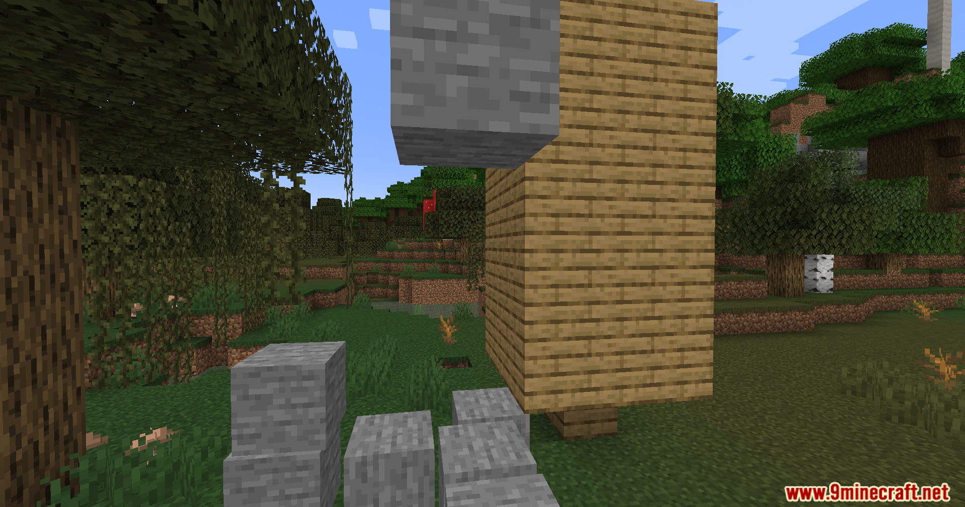 Sable Mod Screenshot 5 A tall wooden structure and stone blocks demonstrating sub level physics in Minecraft