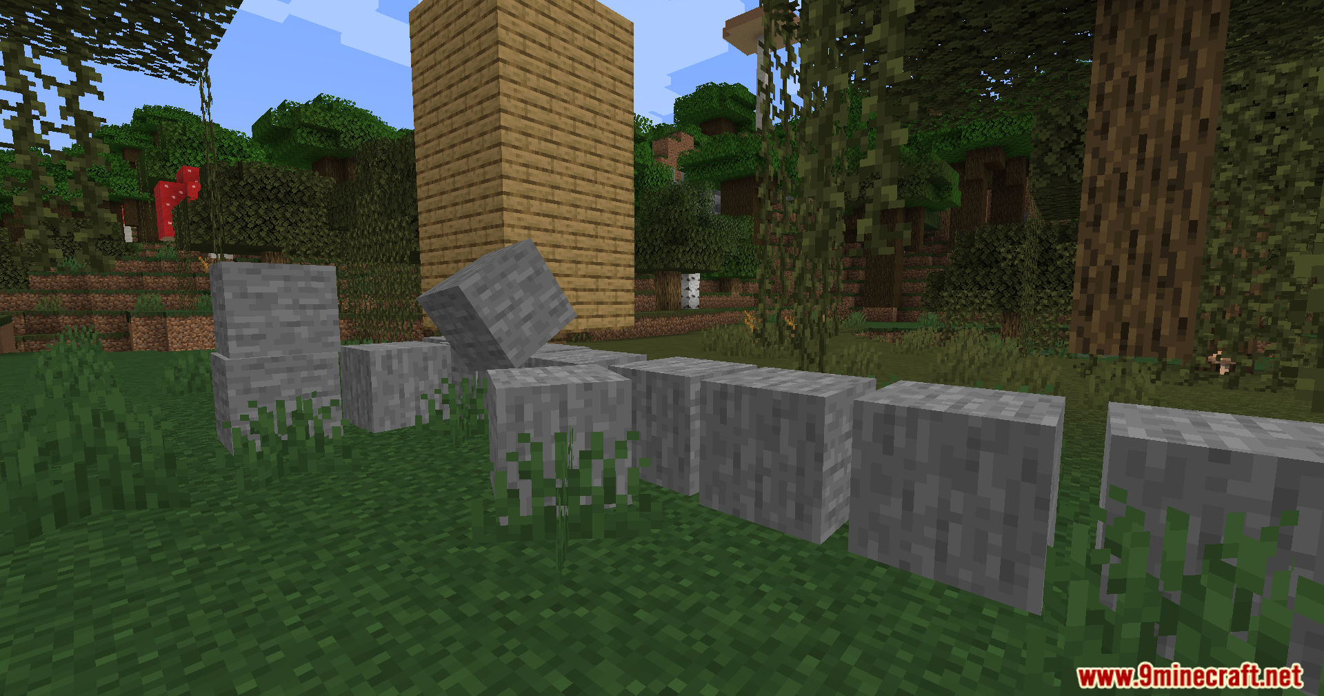 Sable Mod Screenshot 6 Stone blocks scattered on the grass with realistic physics and tilted angles