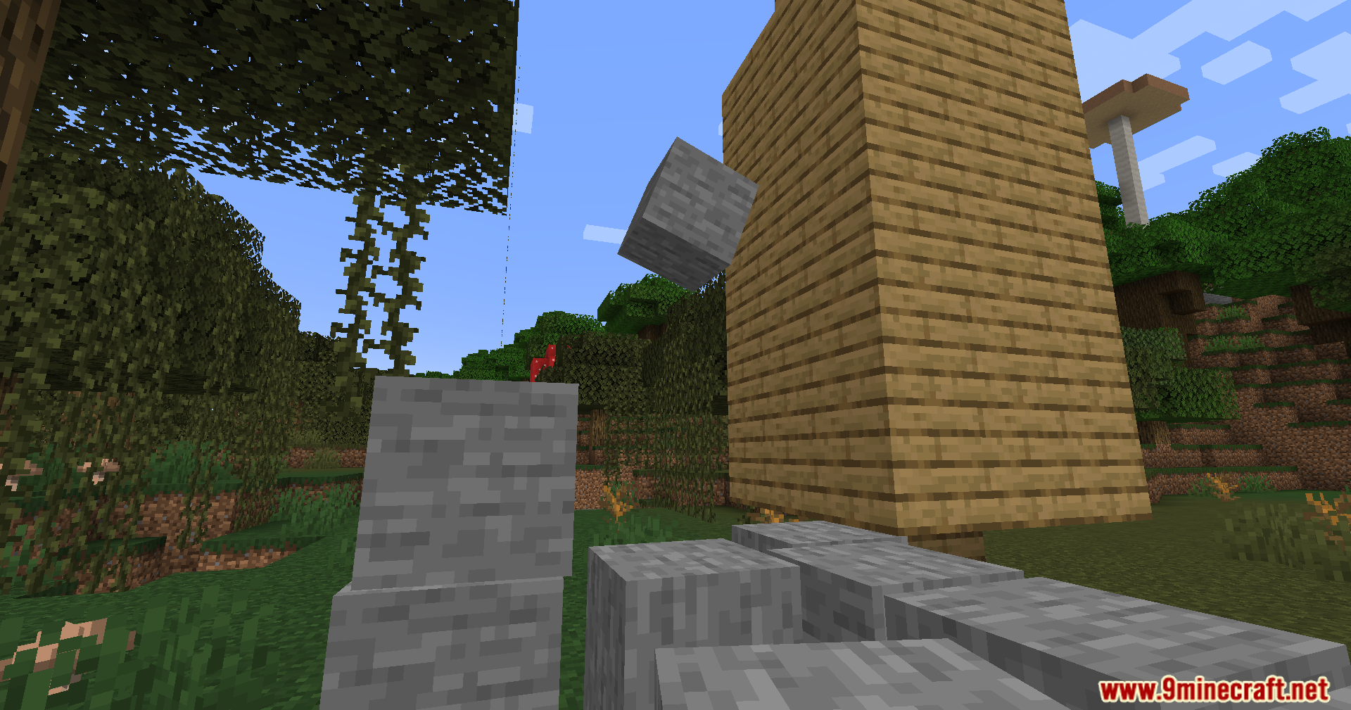 Sable Mod Screenshot 8 A stone block tumbling through the air near a wooden tower