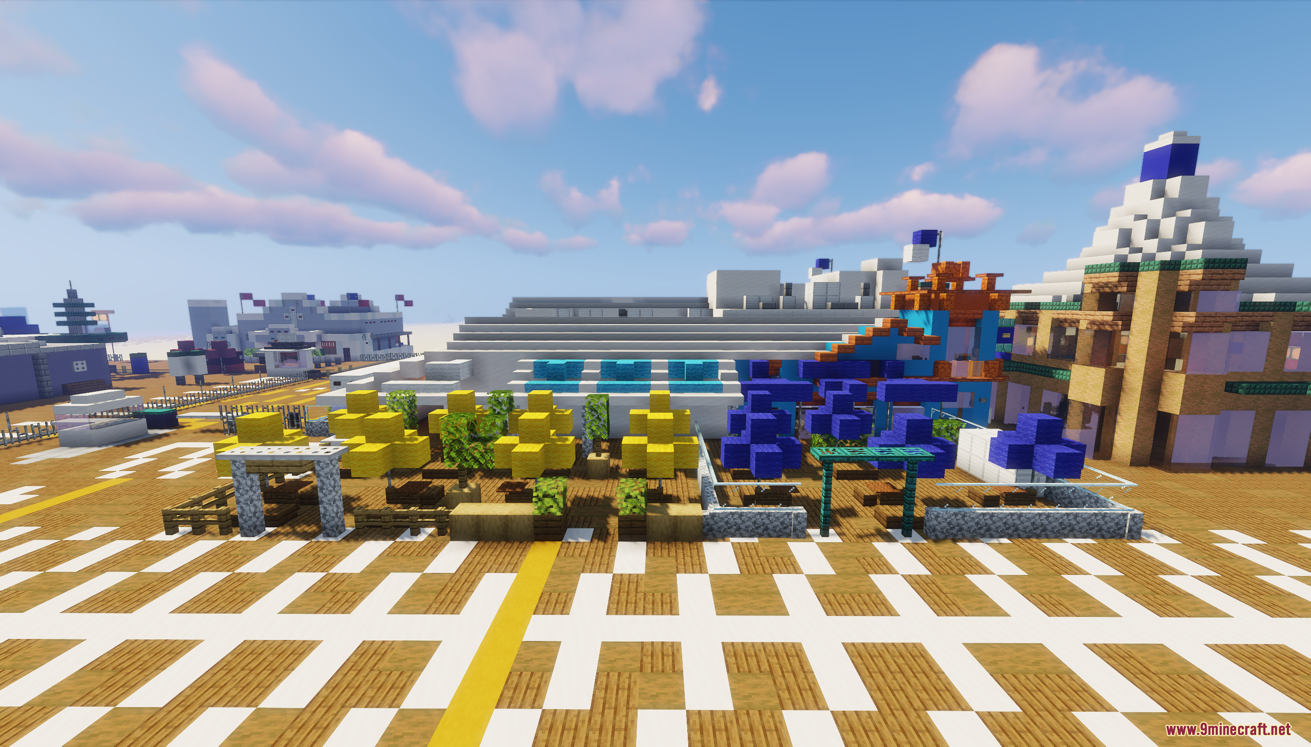 Santa Monica Pier Map Screenshot 3 Outdoor seating area with yellow and blue trees on a wooden boardwalk