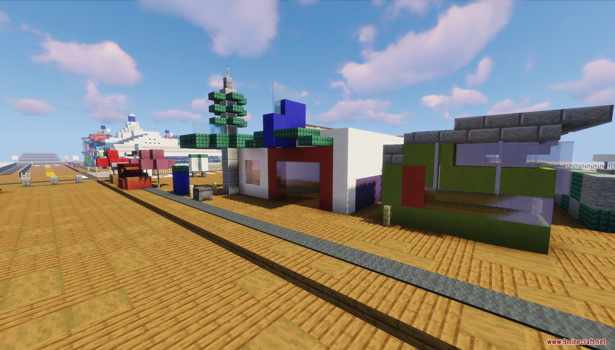 Santa Monica Pier Map Screenshot 5 Colorful buildings and a tall tower stand along a wooden boardwalk path
