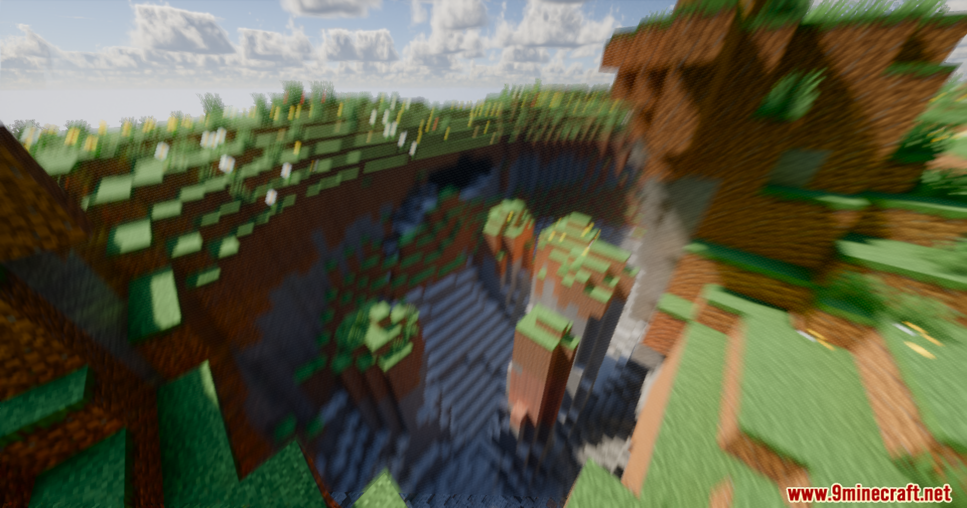 Serendipity Shaders Screenshot 4 A deep Minecraft ravine viewed with a dynamic motion blur shader effect