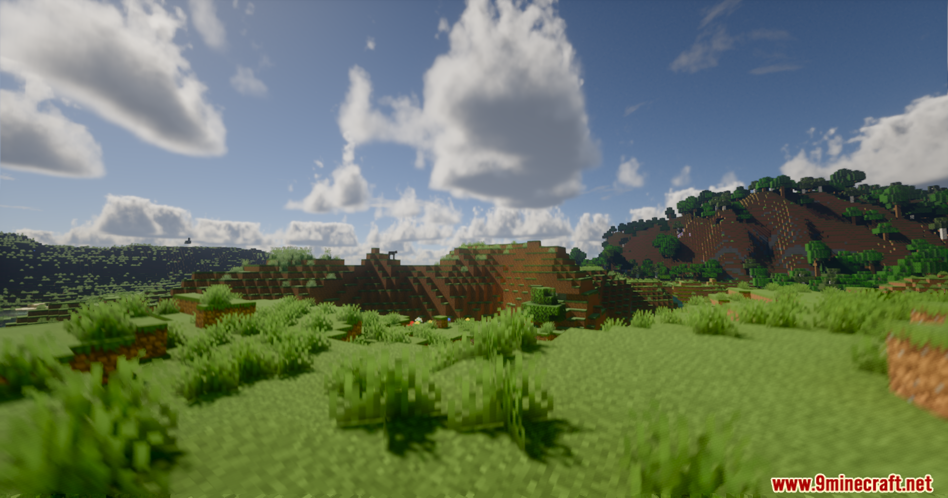 Serendipity Shaders Screenshot 5 Serendipity Shaders creates a scenic landscape with lush hills and volumetric clouds