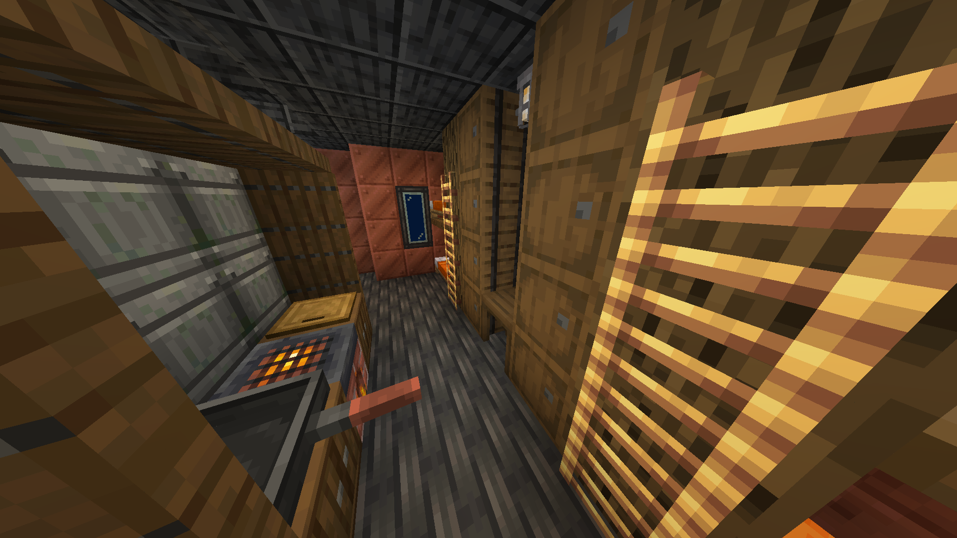 Submarine hallway featuring wooden storage barrels a ladder and kitchen area