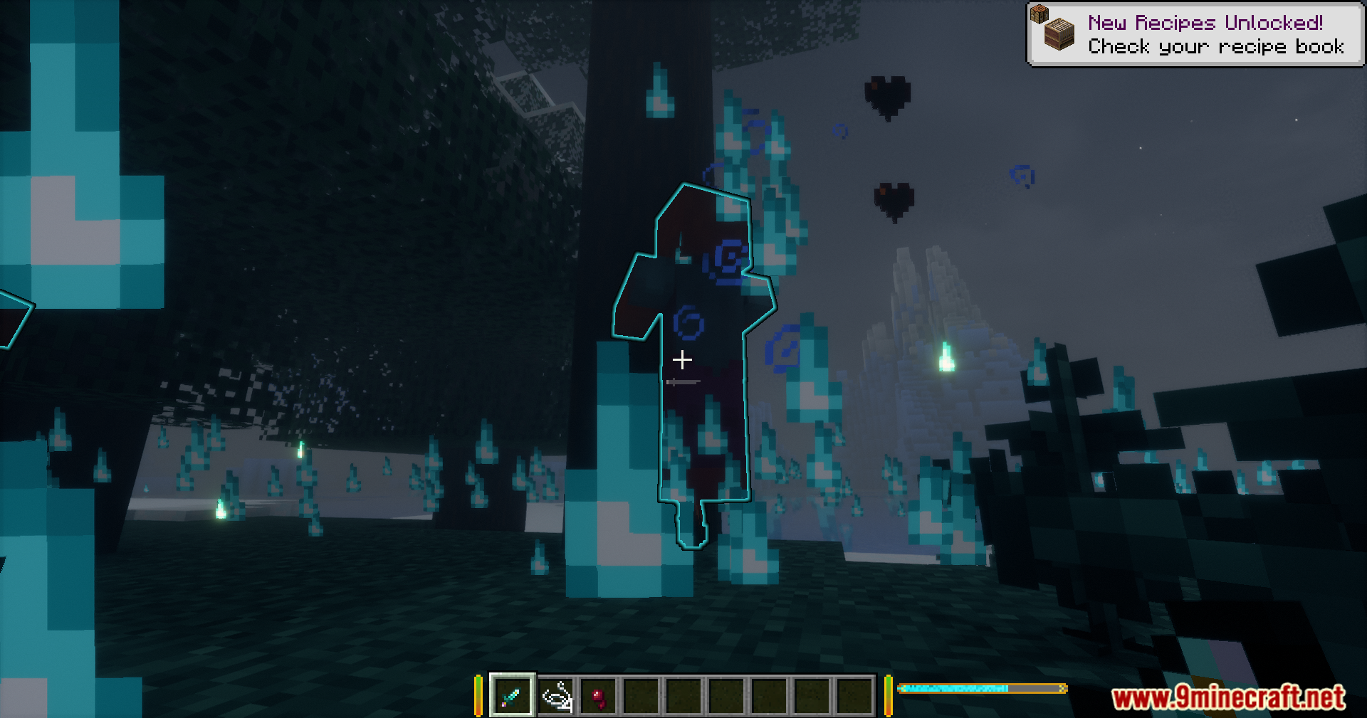 A dark Apostle of the Moon figure stands among blue soul fire