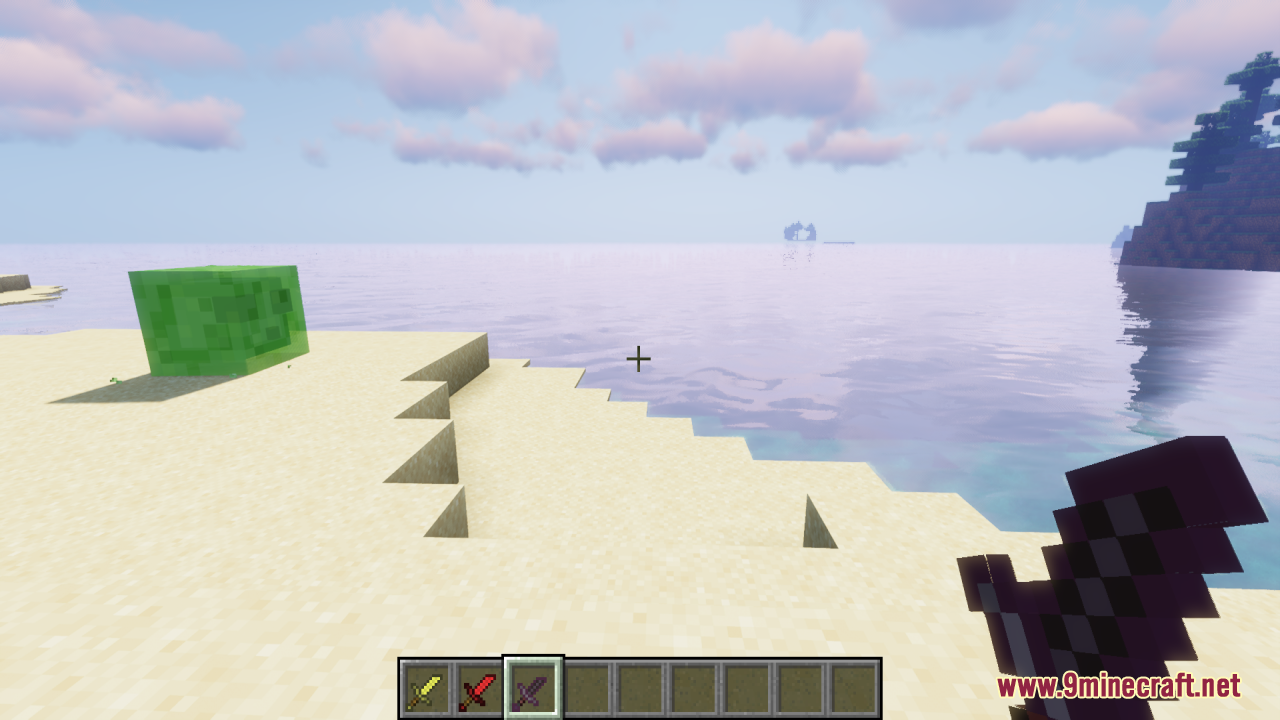 A player holds a short netherite sword while standing on a sandy beach