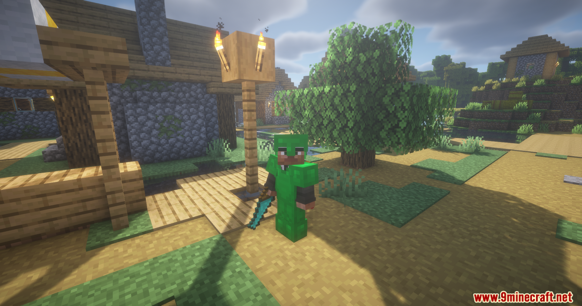Silent Gear Metalworks Mod Screenshot 14 A player wearing green armor holds a diamond sword in a village