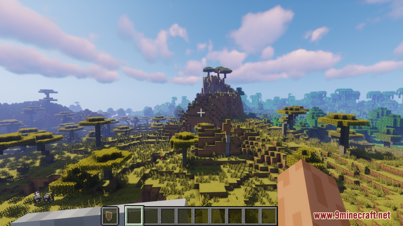 Simple Kite Shield Resource Pack Screenshot 8 First person view of a savanna landscape with hills and acacia trees