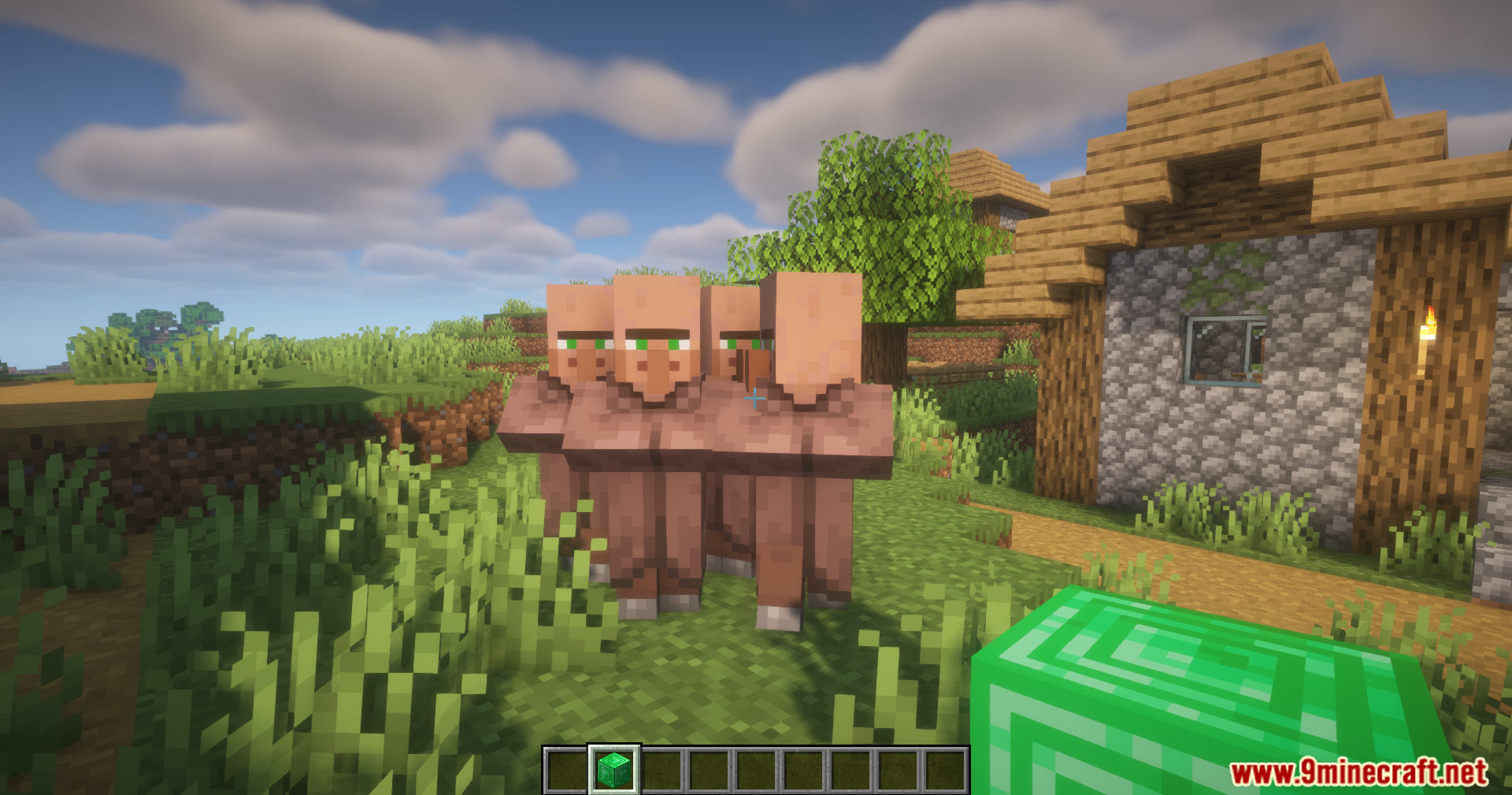 Simple Villager Follow Mod Screenshot 8 Villagers following a player holding an emerald block near a village house
