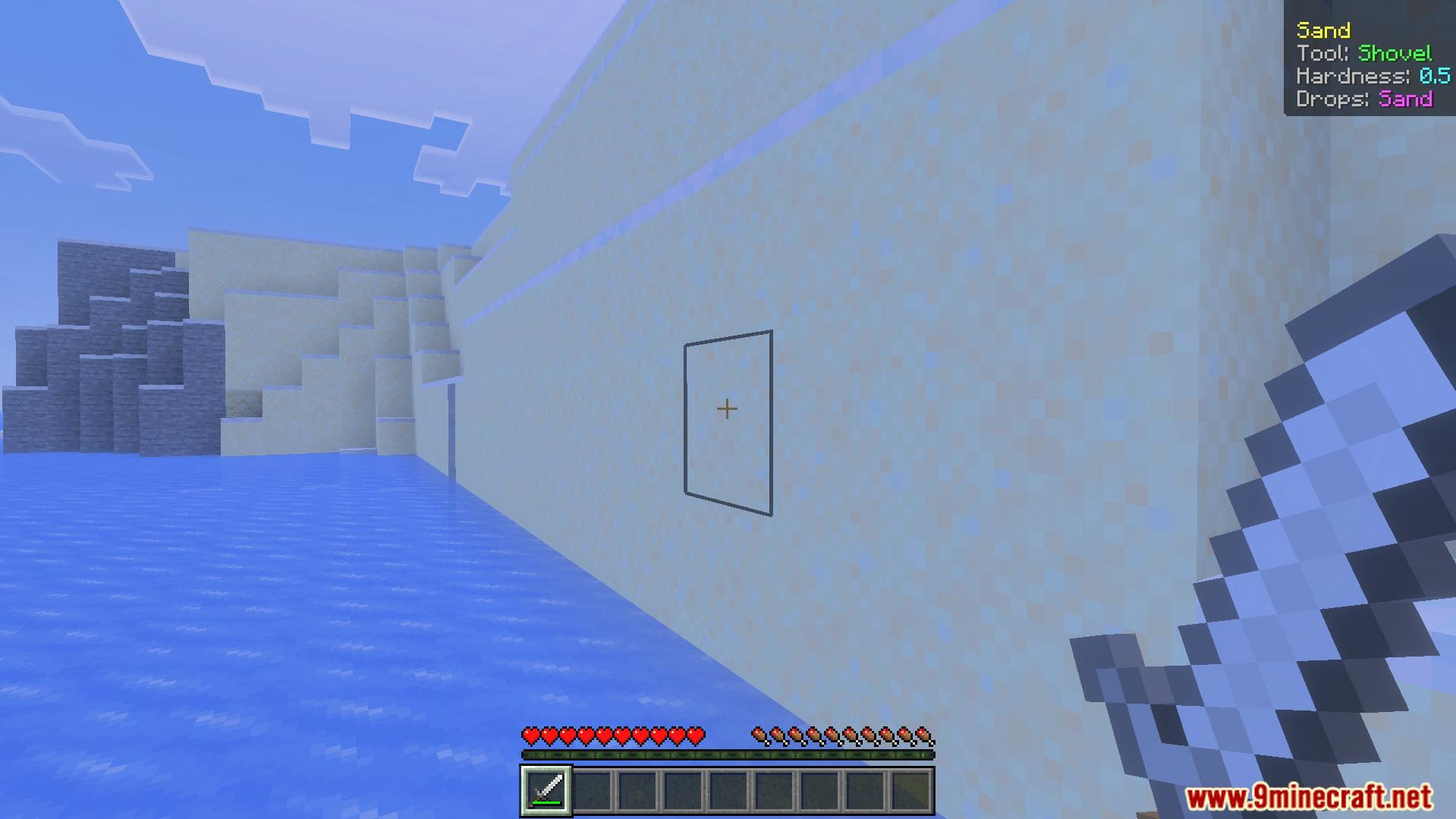 Screen display showing sand block hardness and required tool for mining in Minecraft