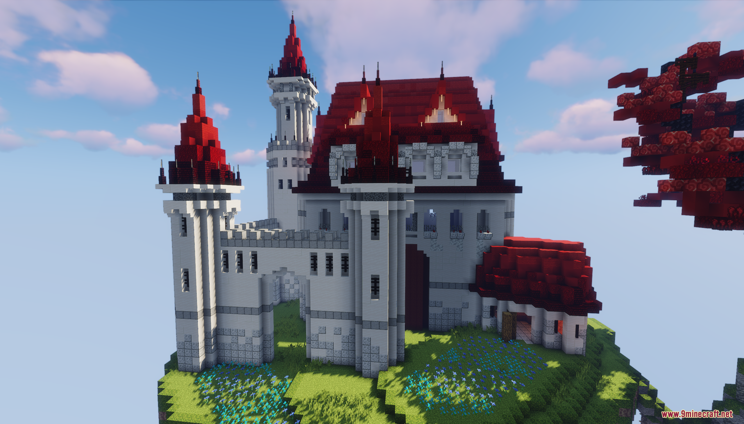 Close up of the white castle with red roofs on a floating island