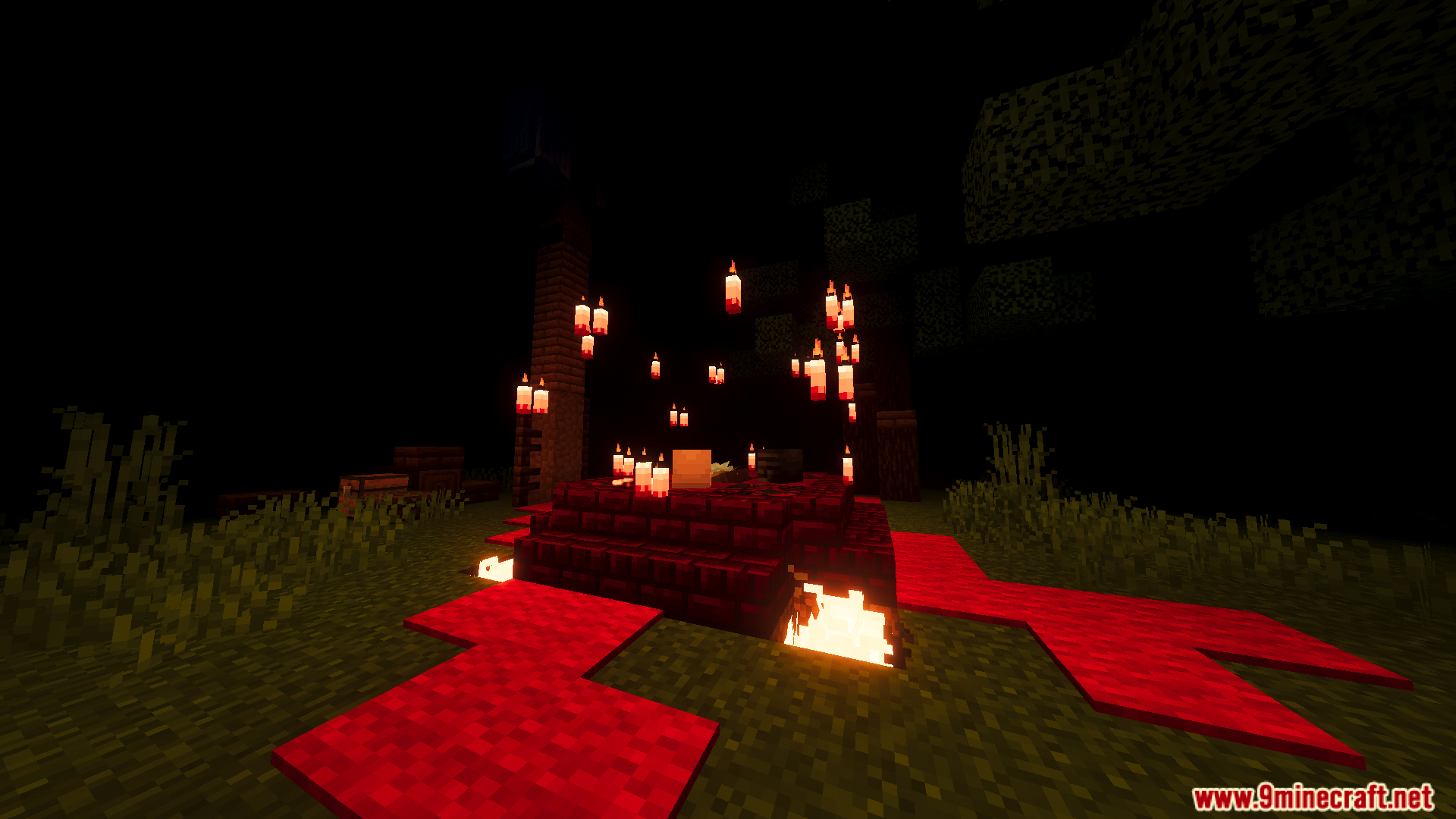 Dark forest scene with red carpet fire and many floating red candles