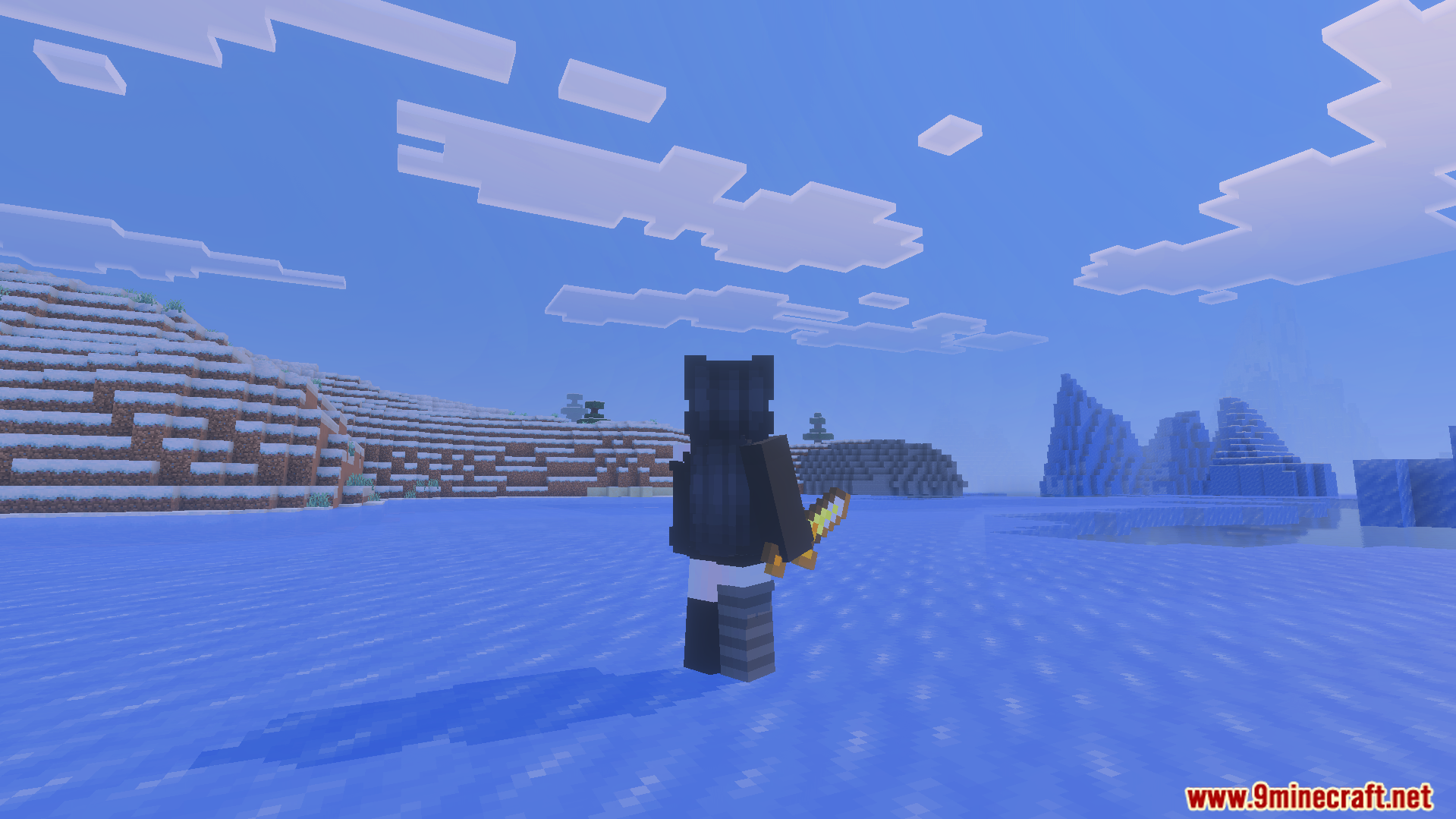 Small Swords Texture Pack Screenshot 6 Third person view of a player holding a small golden sword in snow