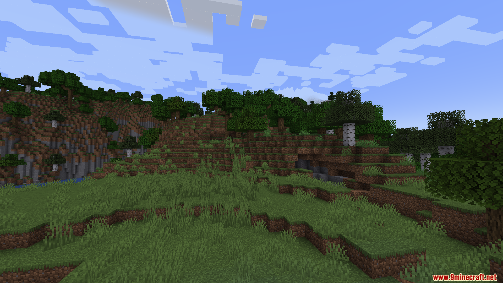 Smooth Boot Reloaded Mod Screenshot 2 A scenic view of a lush green forest biome under a bright blue sky