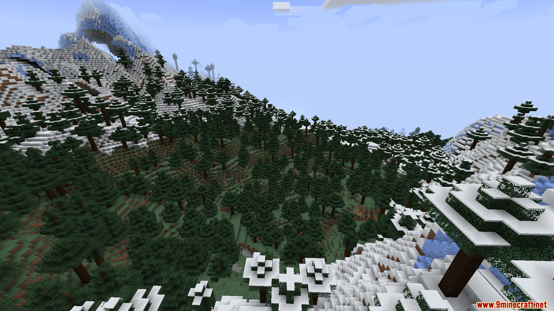 Smooth Boot Reloaded Mod Screenshot 8 A deep valley of spruce trees surrounded by snowy mountain slopes