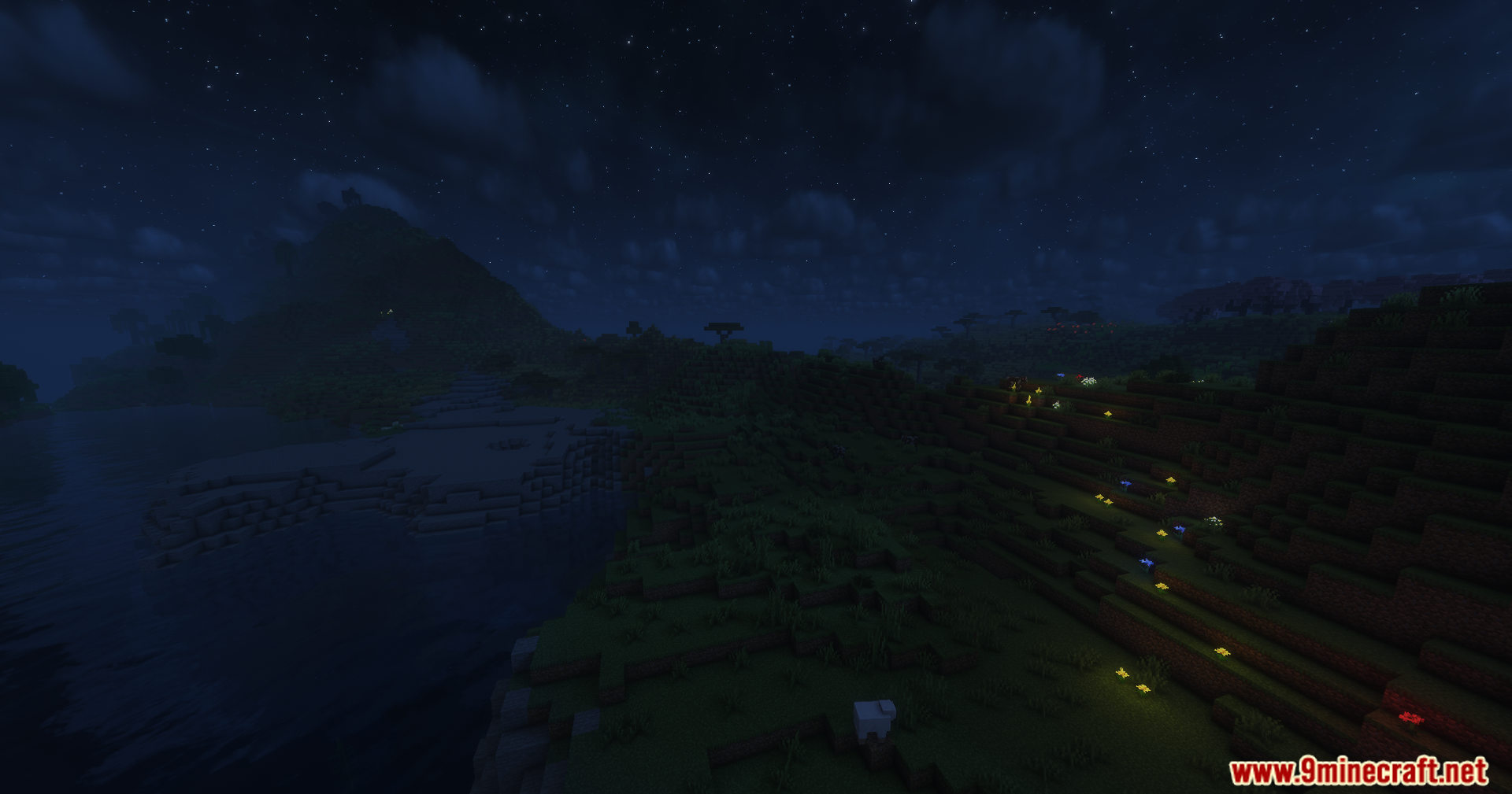 Solar Shaders Screenshot 10 Glowing flowers on a dark hillside next to a river in Minecraft