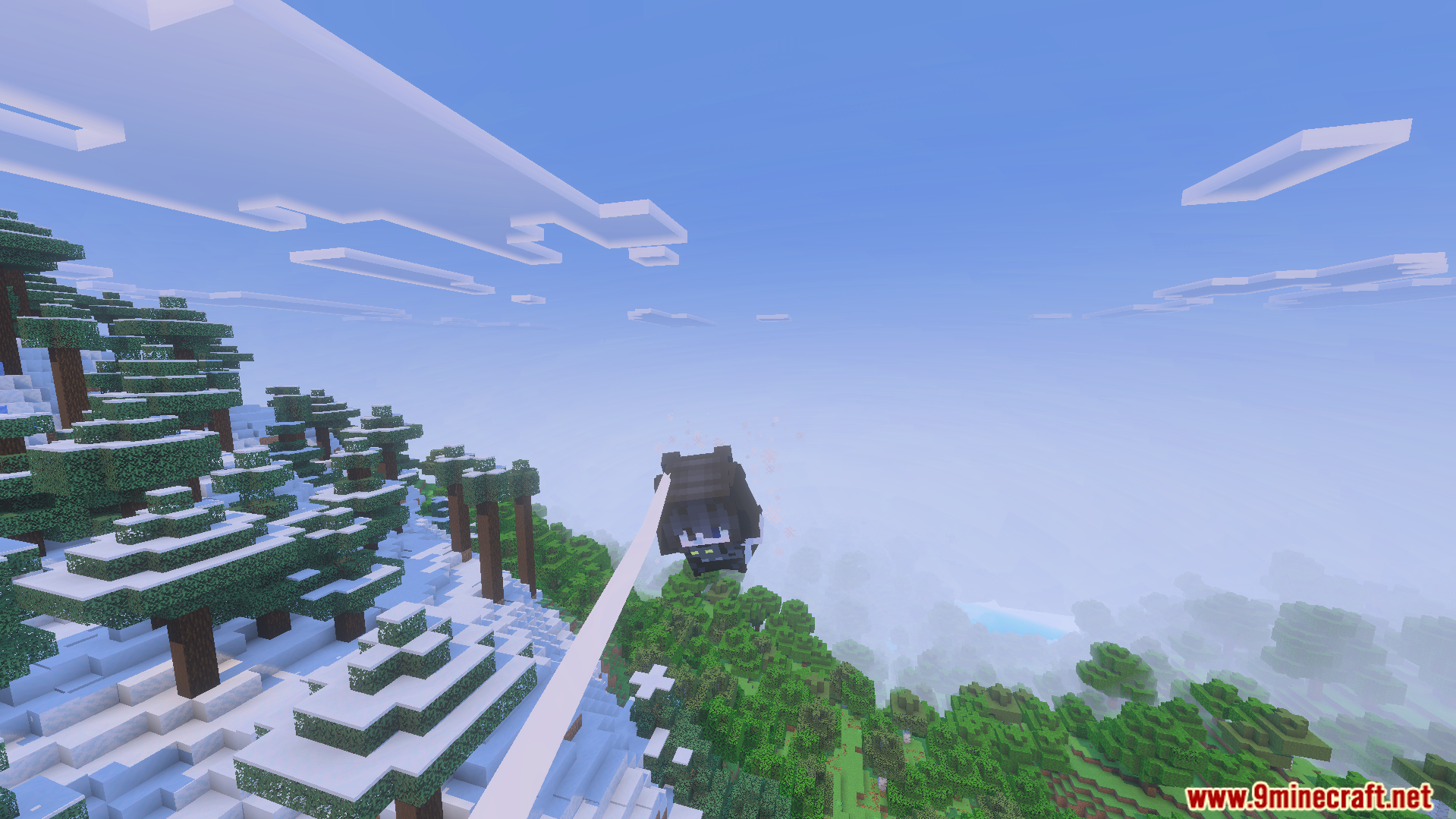 Player in a black suit swings through the air over a snowy mountain