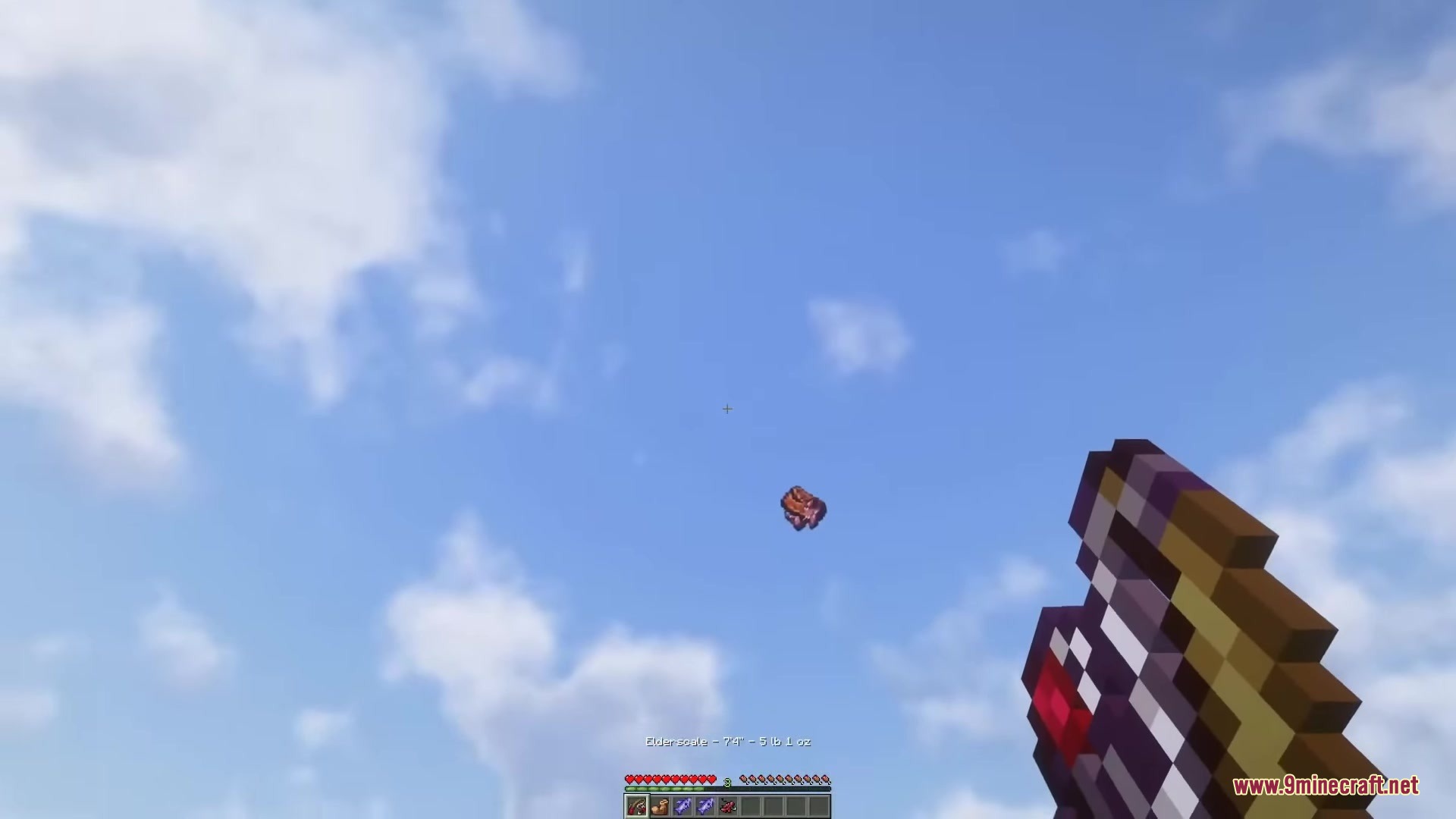 Starcatcher Mod Screenshot 4 A player holding a fishing rod watches a fish flying in the sky