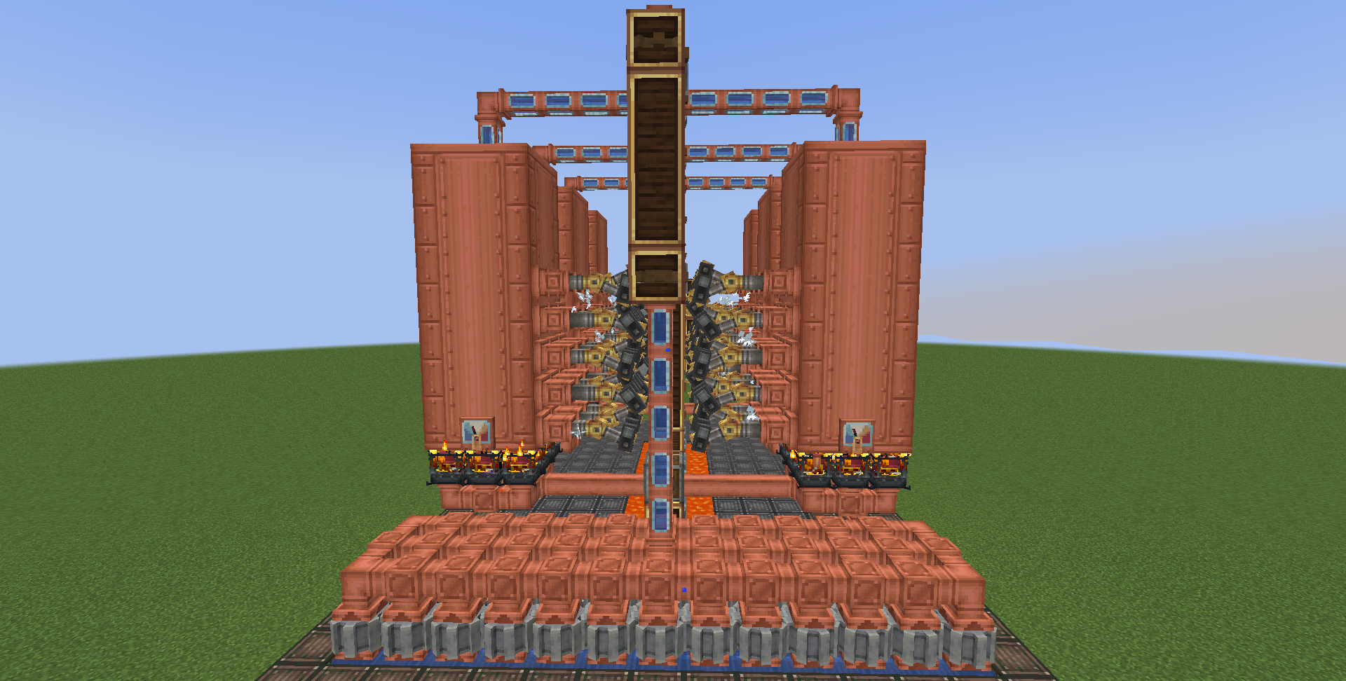 A massive copper steam engine structure with complex piping and brass gears