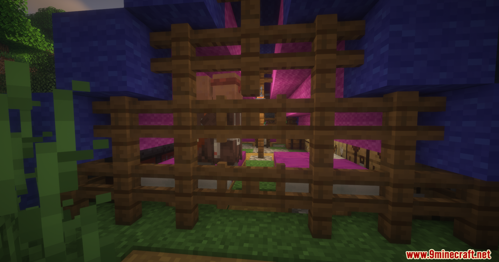 Colorful villager camp made of blue and pink wool blocks in Minecraft